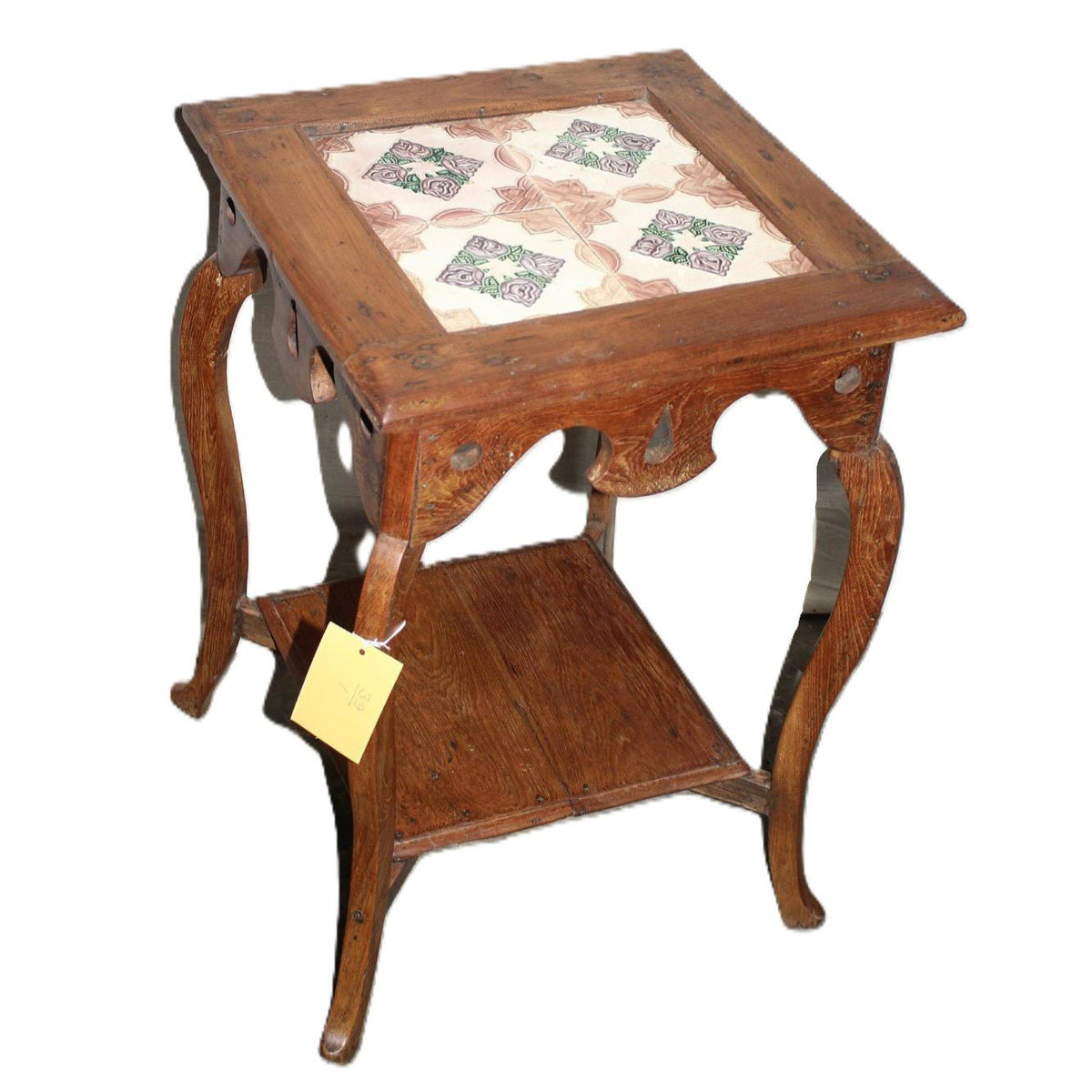 Vintage teak side table with a tiled top for hot drinks and a small shelf beneath, 65cm high by 45cm square.