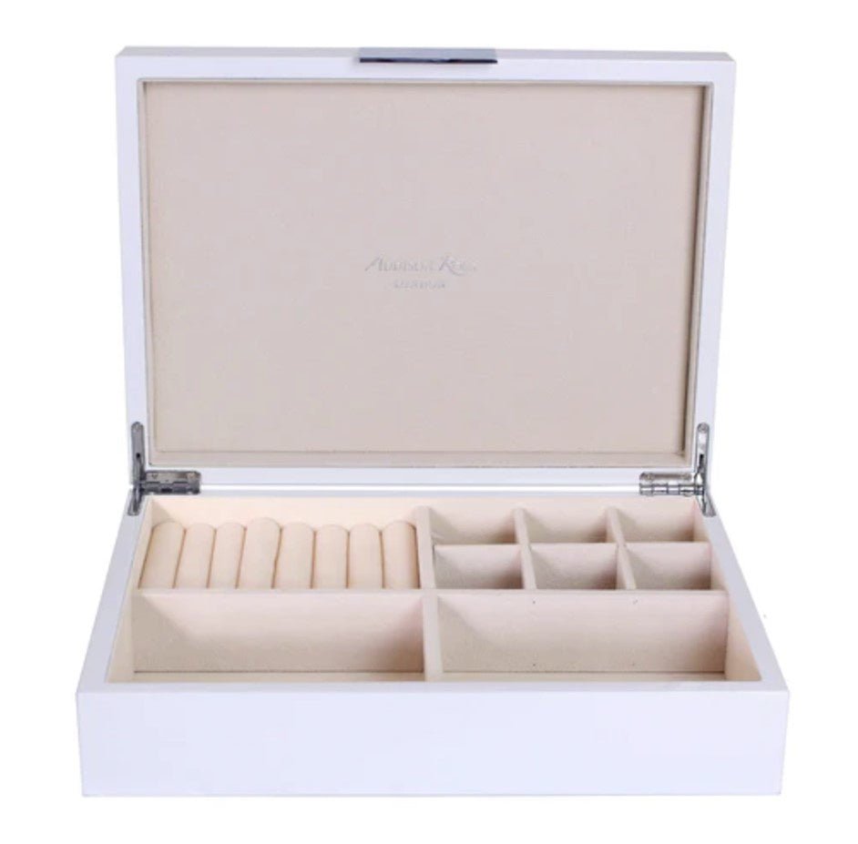 White lacquer jewellery box, silver hinge, cream suede lining, detail