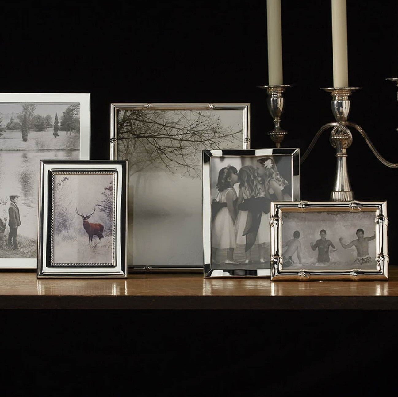 Addison Ross silver bamboo frame styled on a shelf
