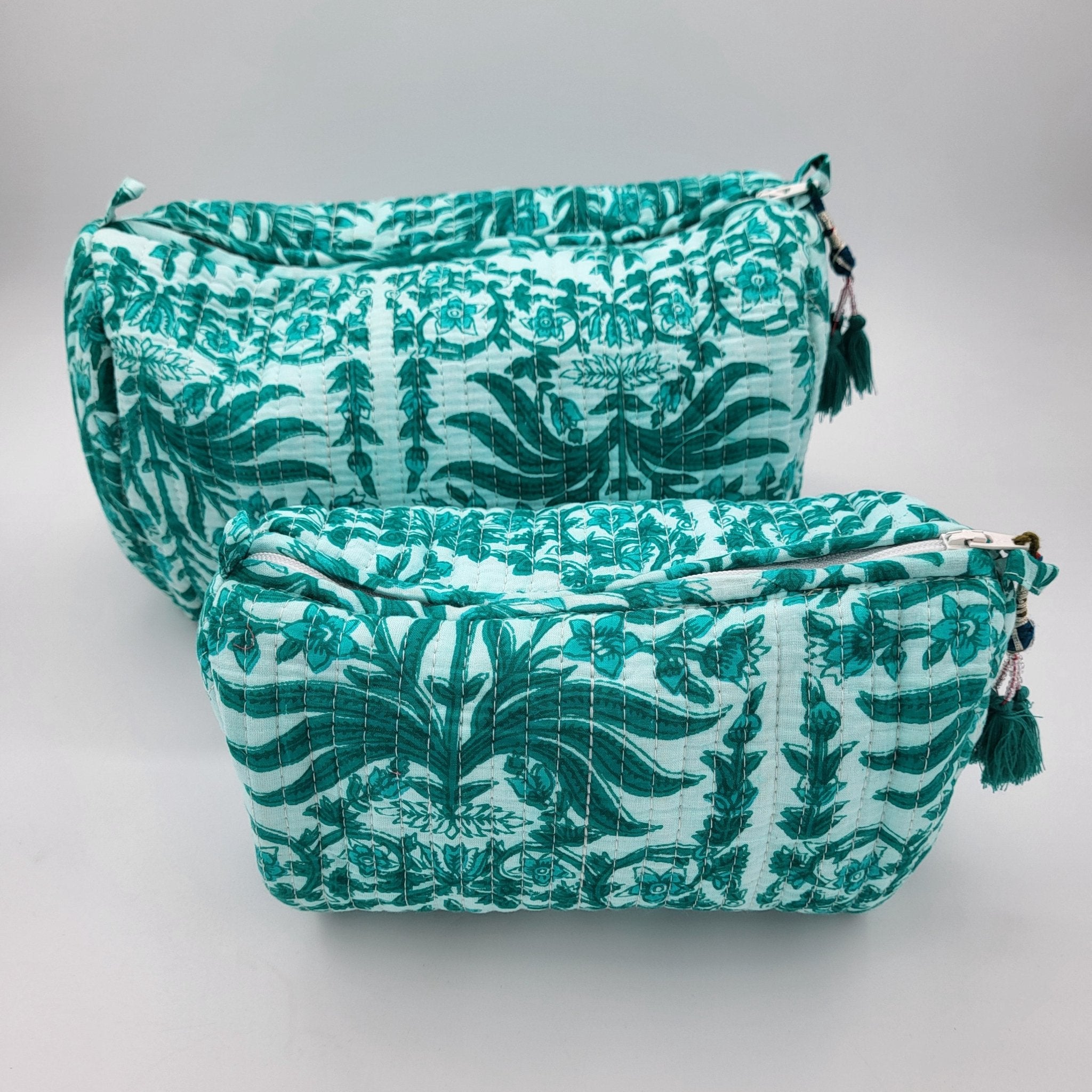 Aqua block-print wash bag with a tassel zip