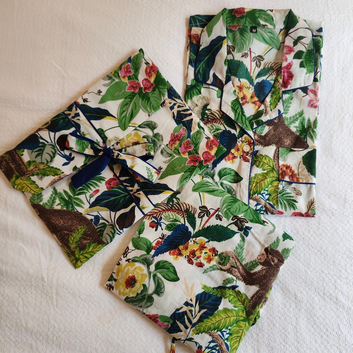 Block-print cotton pyjamas in bird and animal prints, long-sleeved with contrast trim