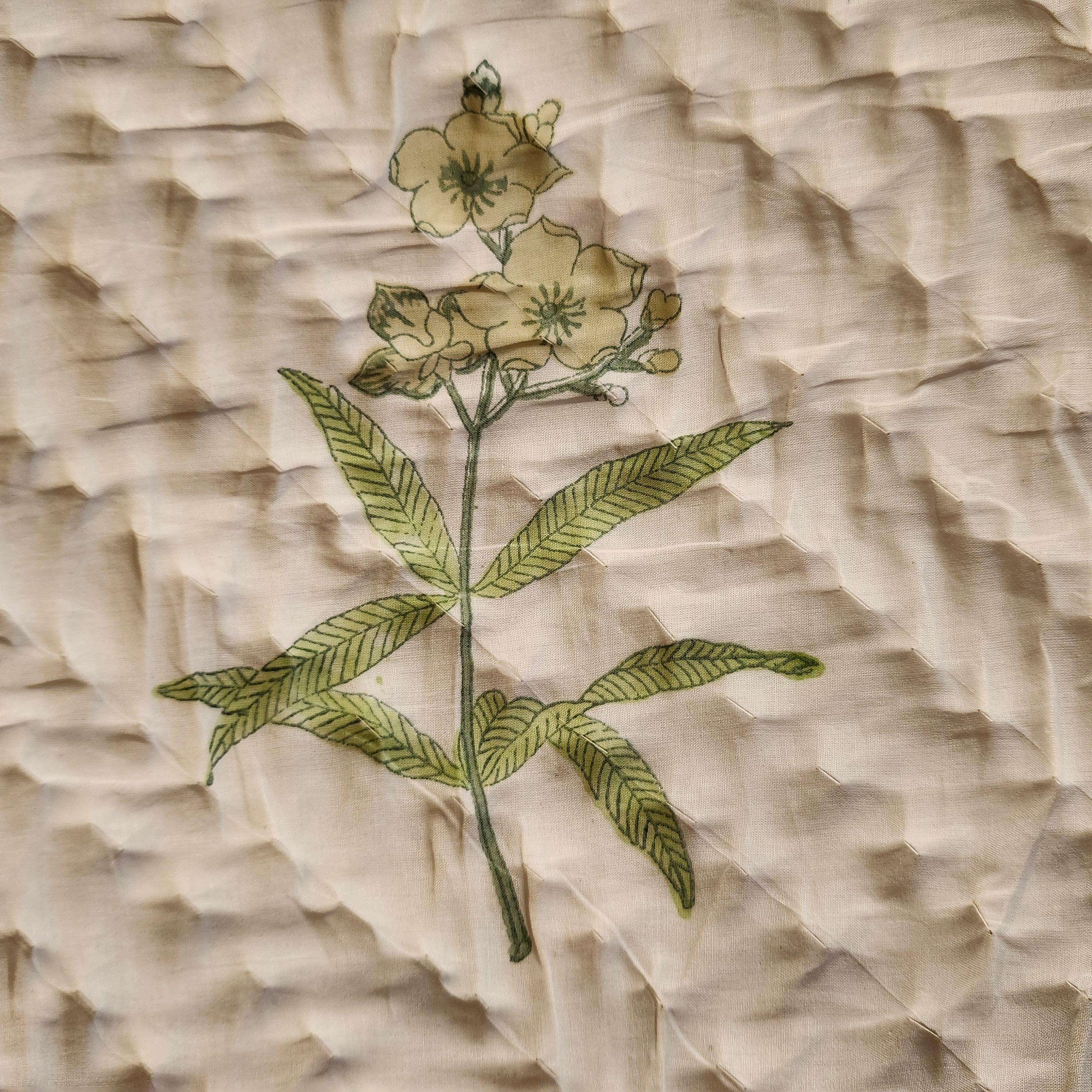 Yellow flowers block-print quilt with a striped border