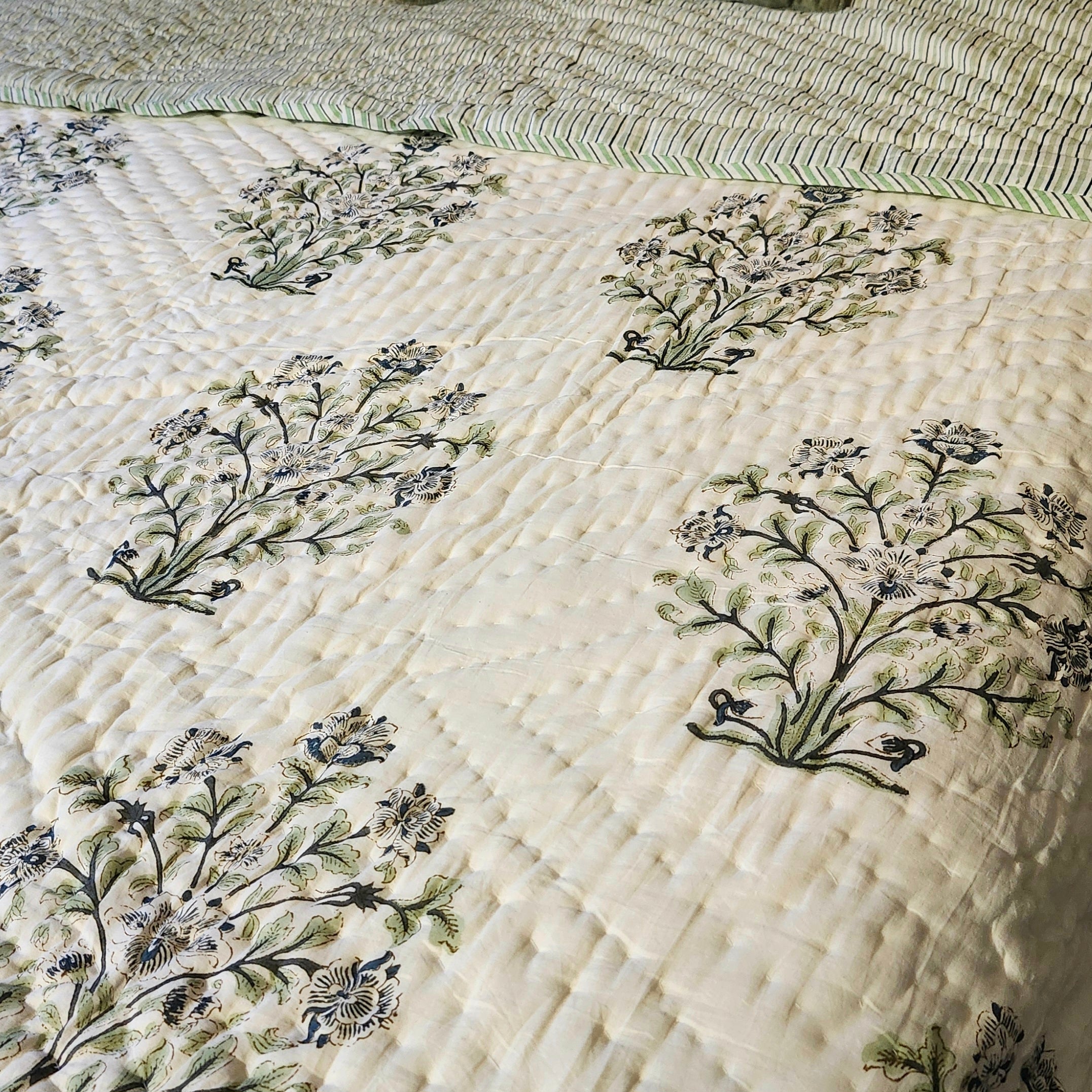Block-print quilt, blue flowers side