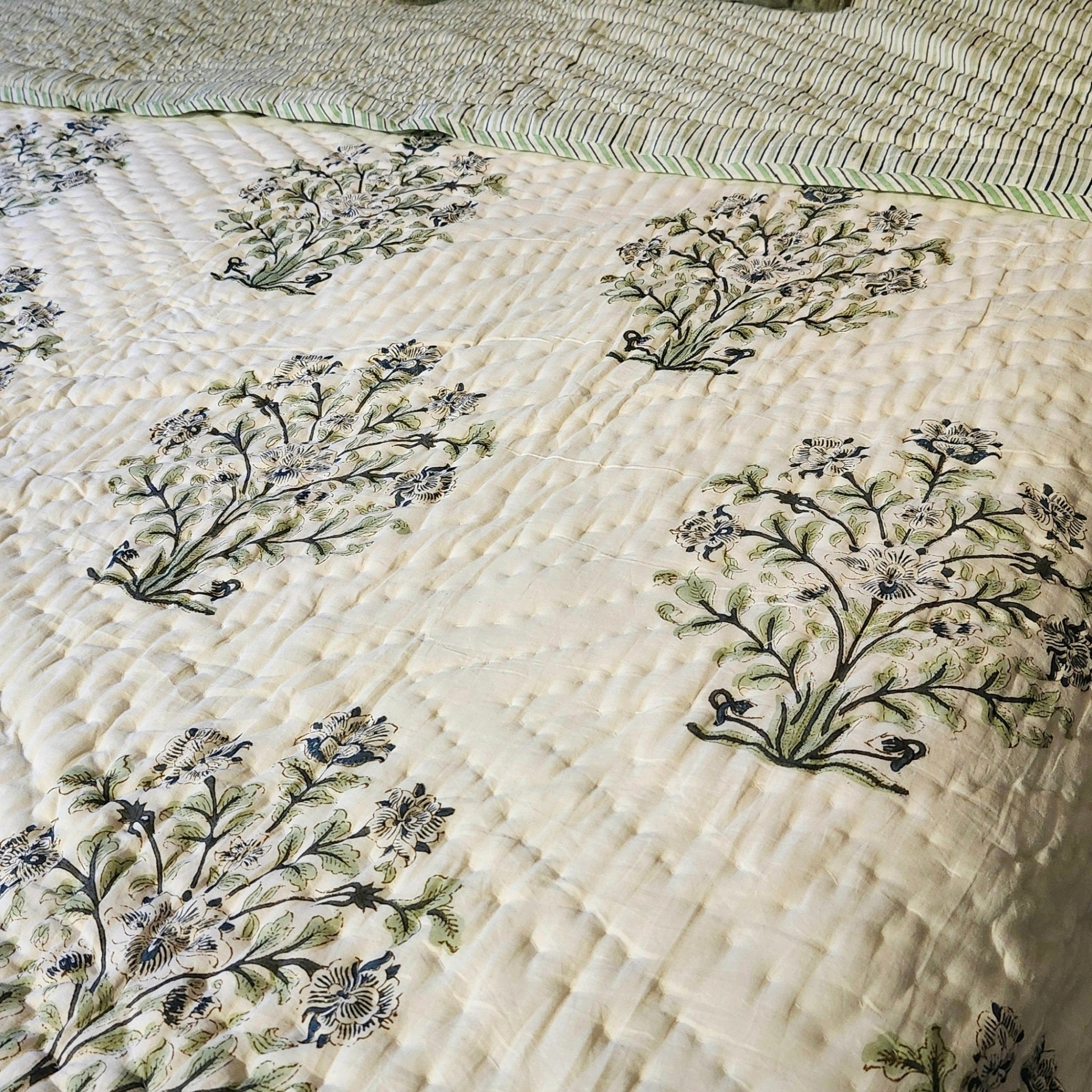 Block-print quilt, blue flowers side