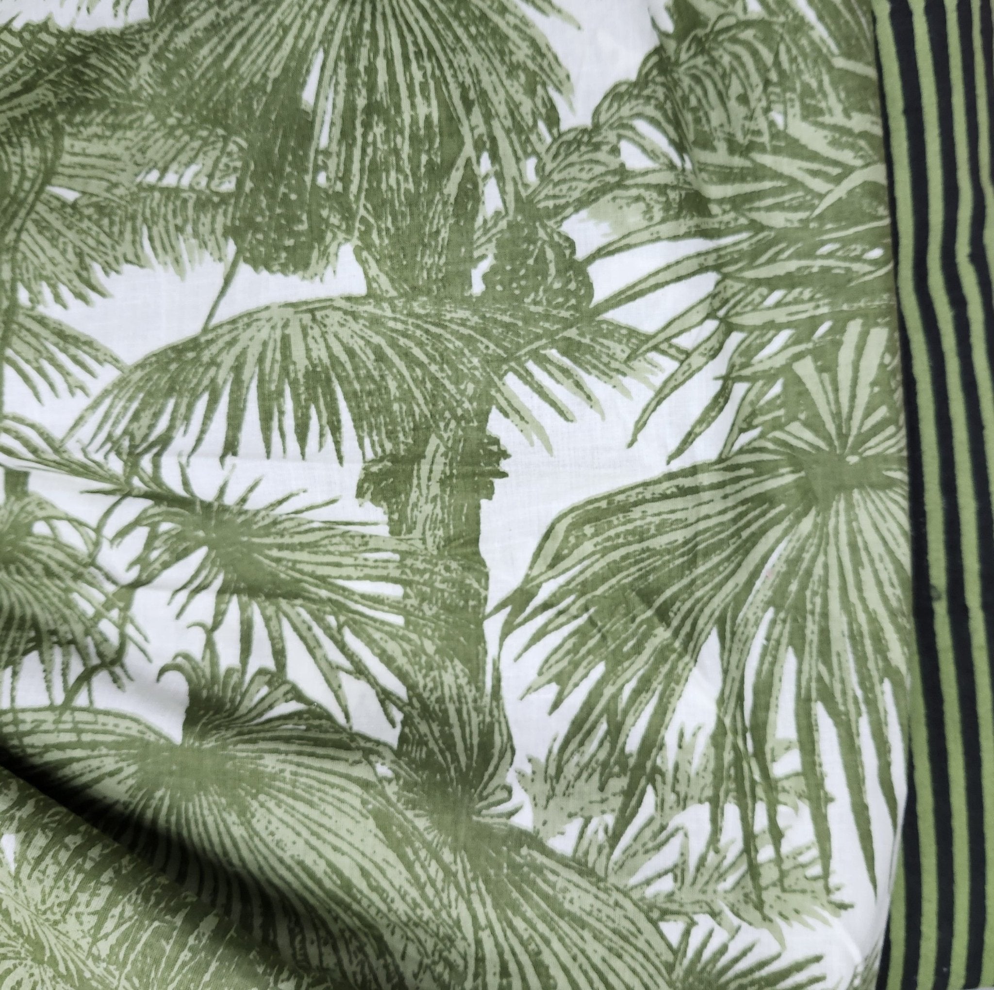 Fan palm print cotton bathrobe, contrast green and black trim, detail view