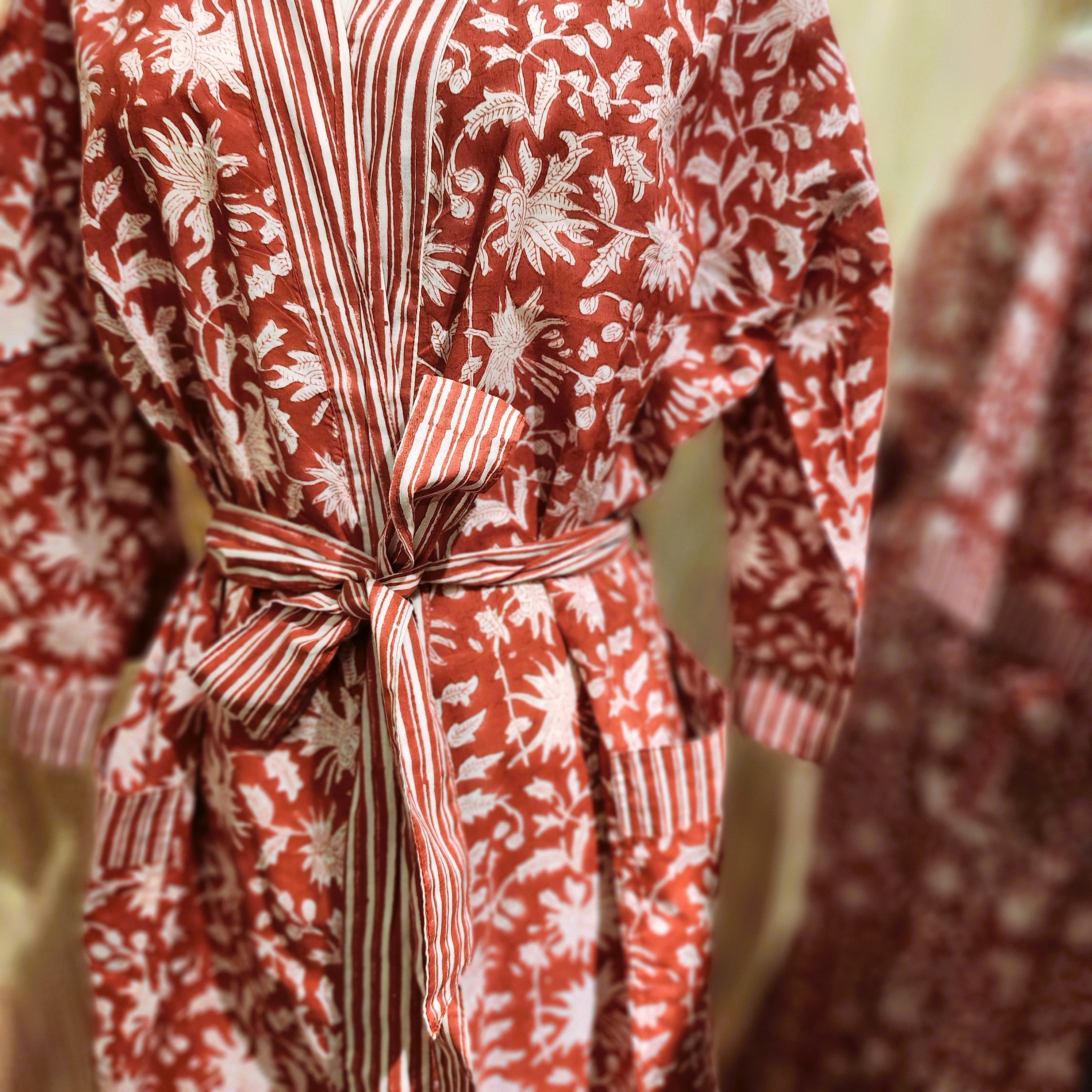 Red and white block print cotton robe, toning belt and trim, styled