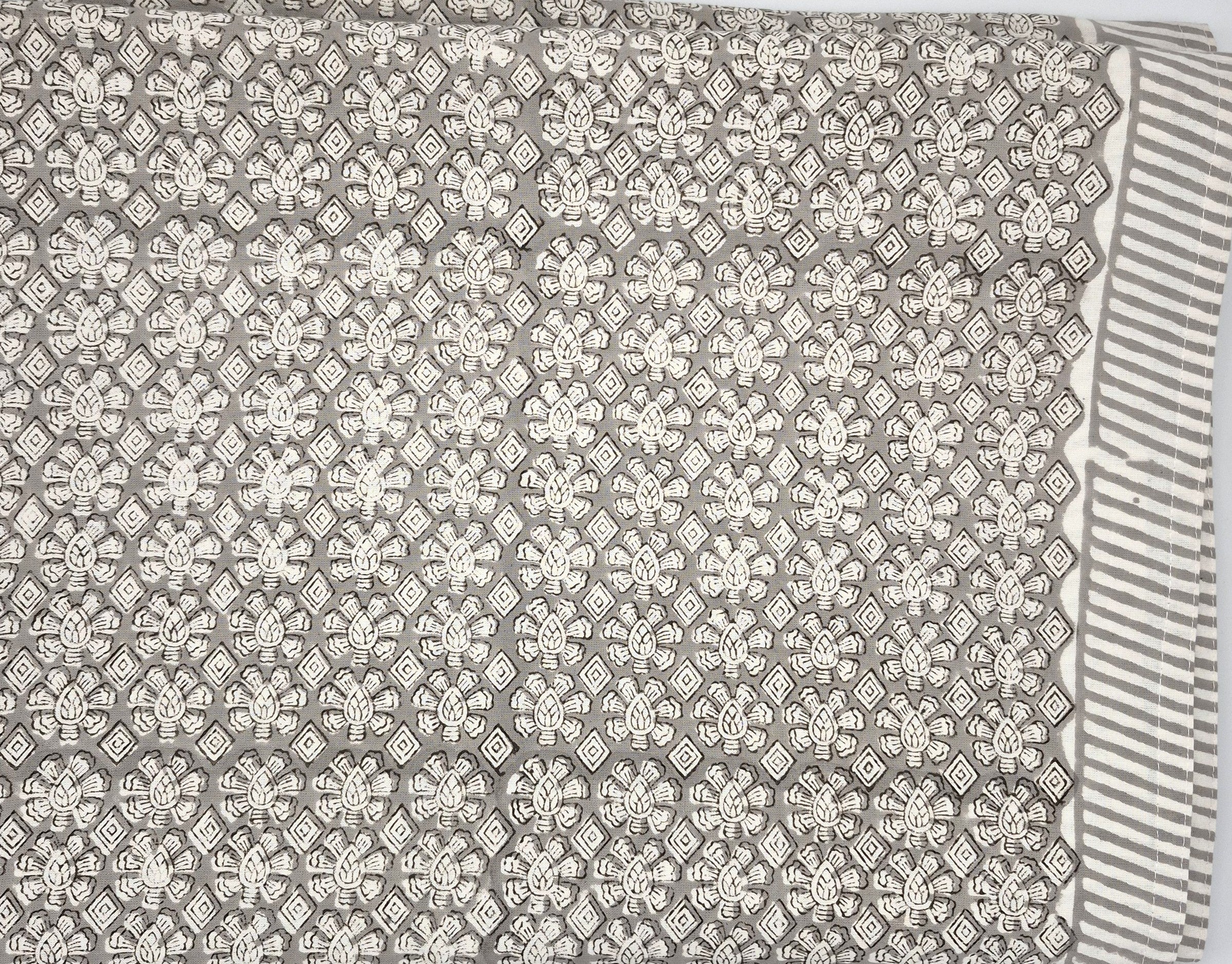 Geometric taupe block-print cotton tablecloth on white