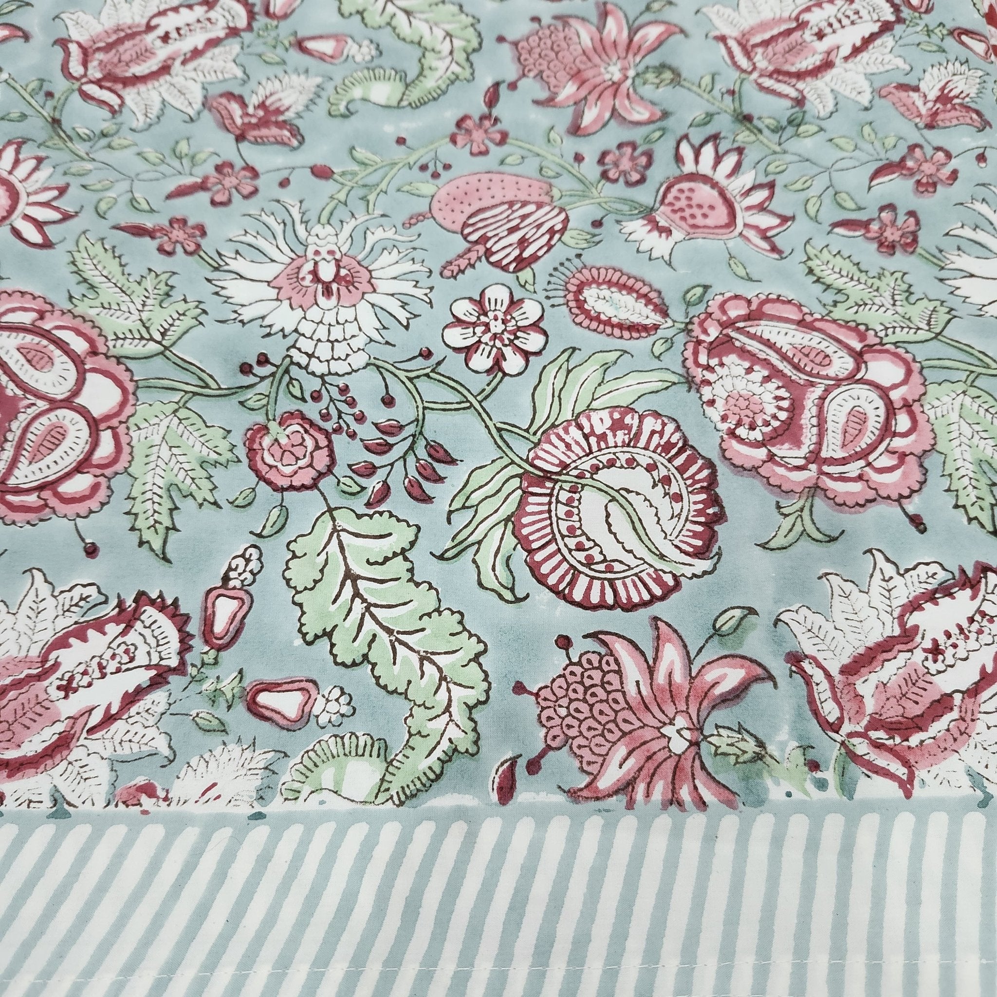 Hibiscus block-print cotton tablecloth, pink and green flowers on pale blue