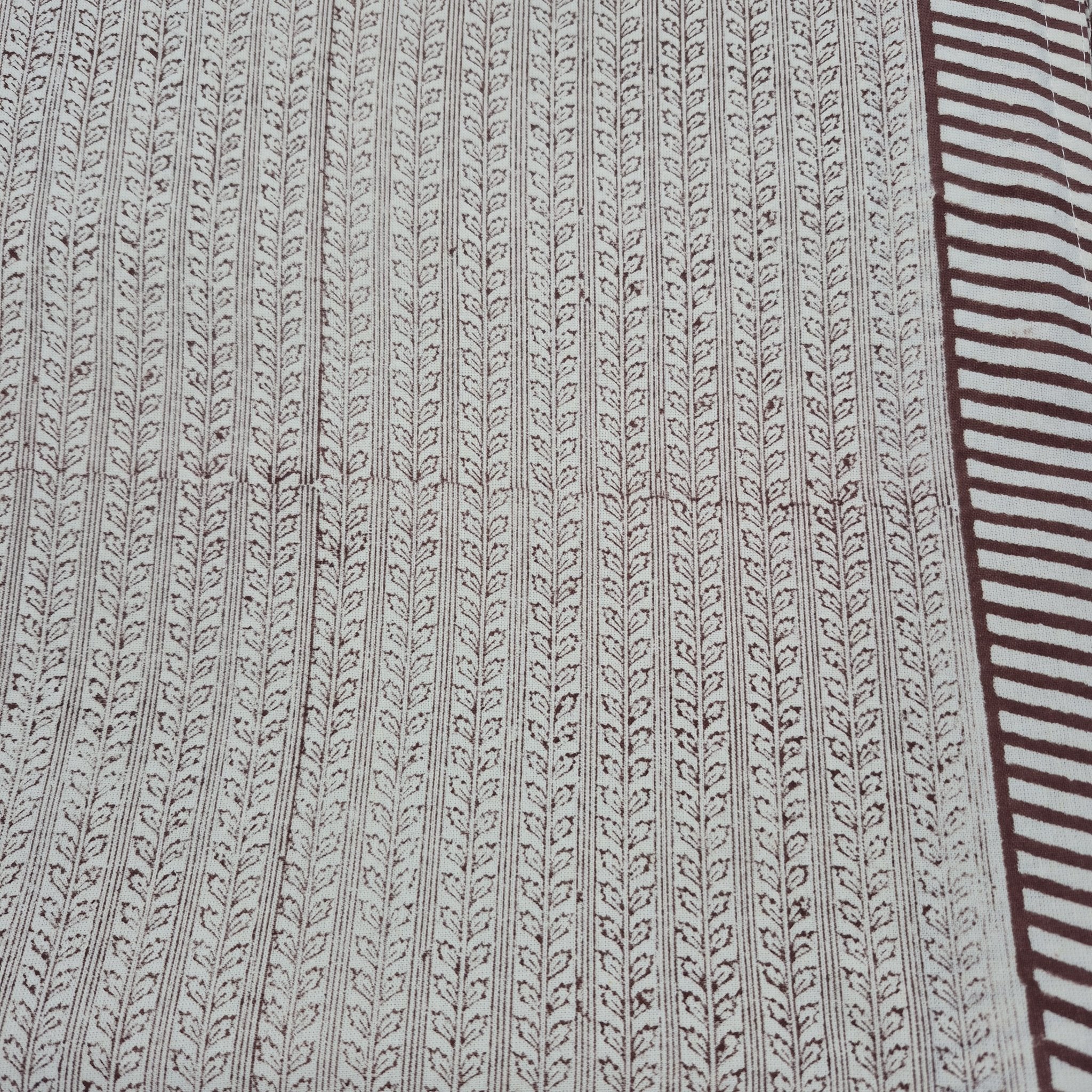Brown leaf-stripe block-print cotton tablecloth on off-white