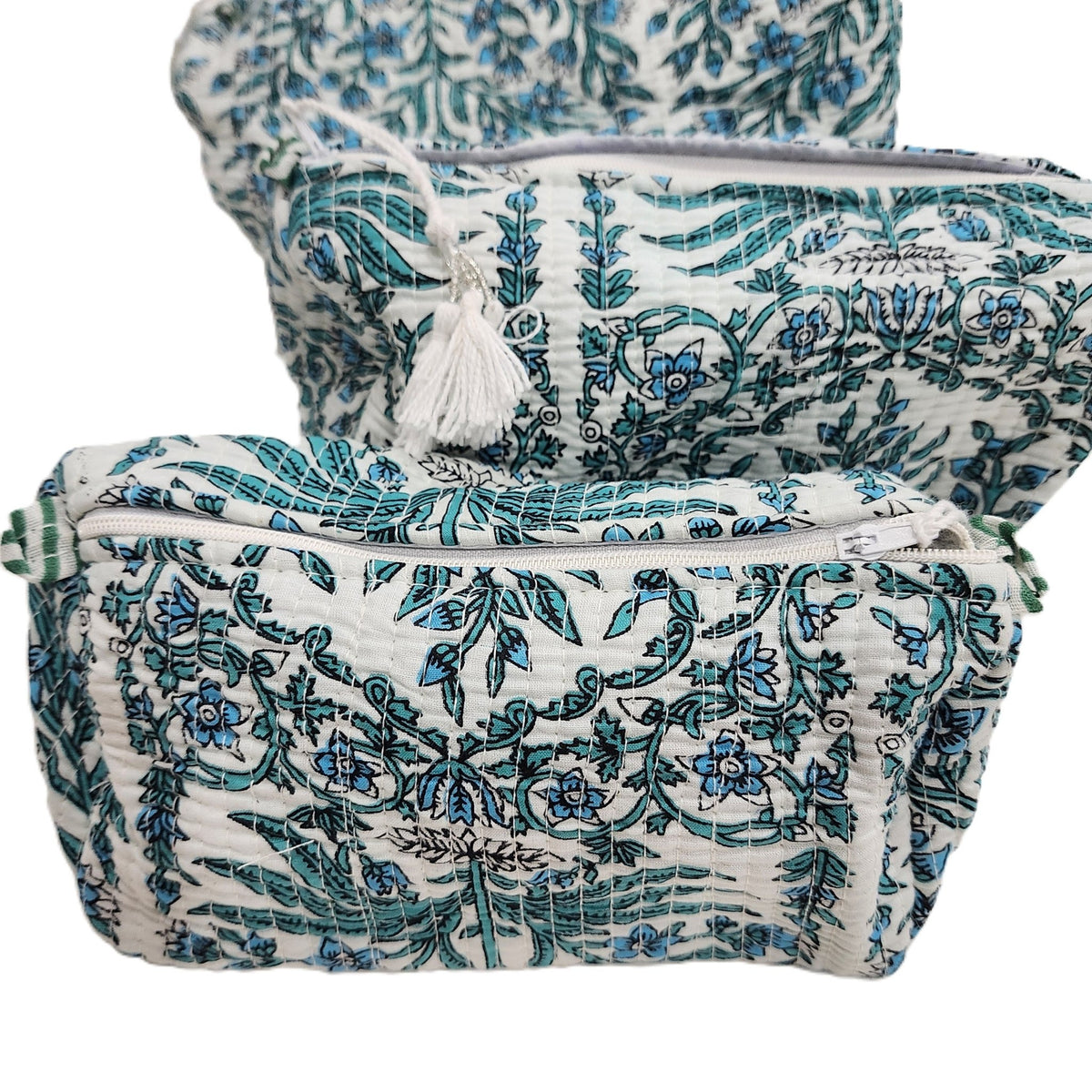 Handmade turquoise floral wash bag in intricate block print, with a spacious interior, sturdy zip and tassel, sizes S, M, L