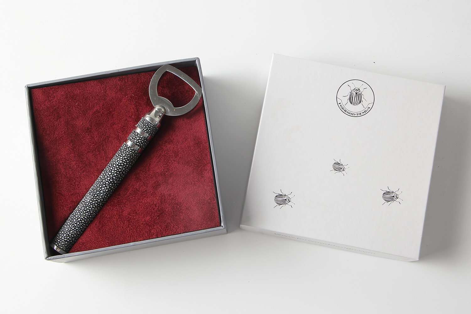 Charcoal faux shagreen bottle opener, stainless steel, detail of textured shagreen handle