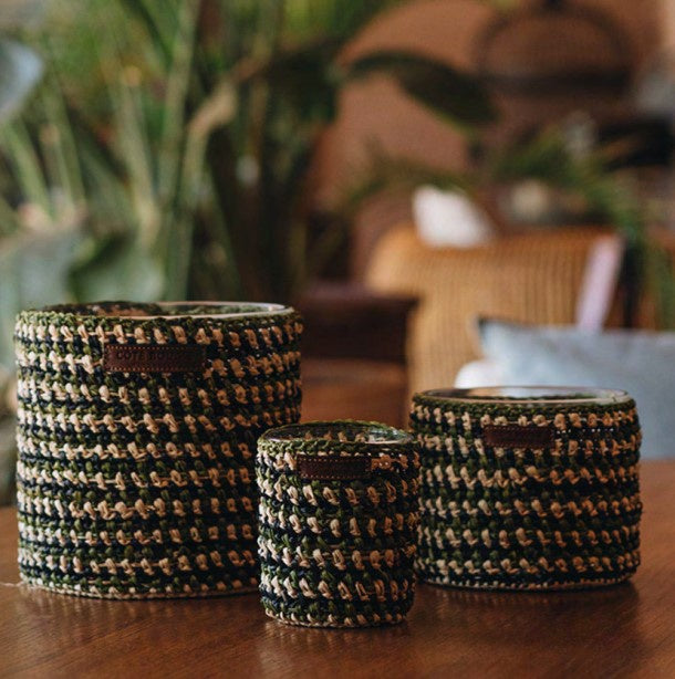 Raphia Mona Dates candle in natural, charcoal and olive raffia, date and patchouli scent