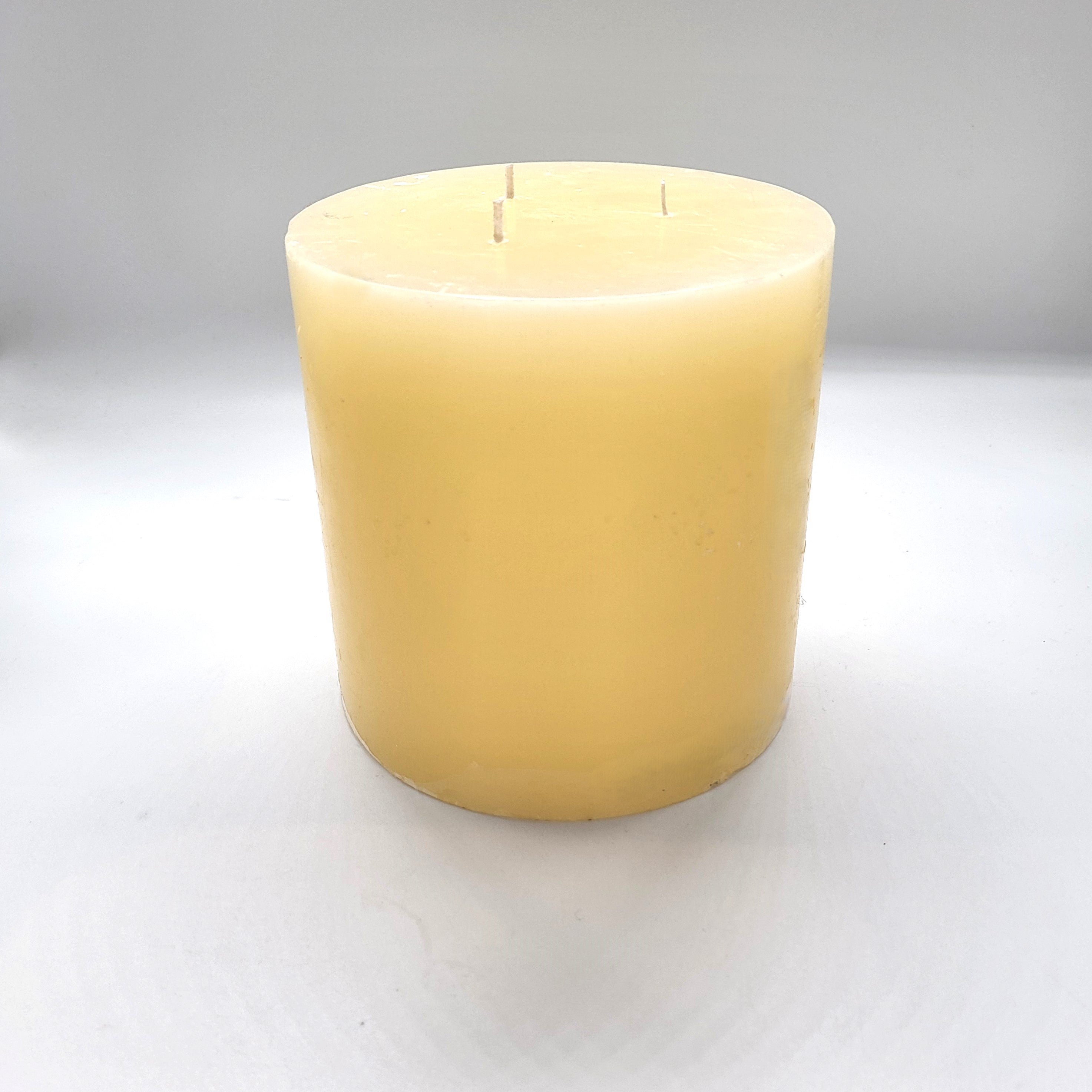 Ivory pillar candle, 15 cm diameter and 15 cm high, three wicks, paraffin wax