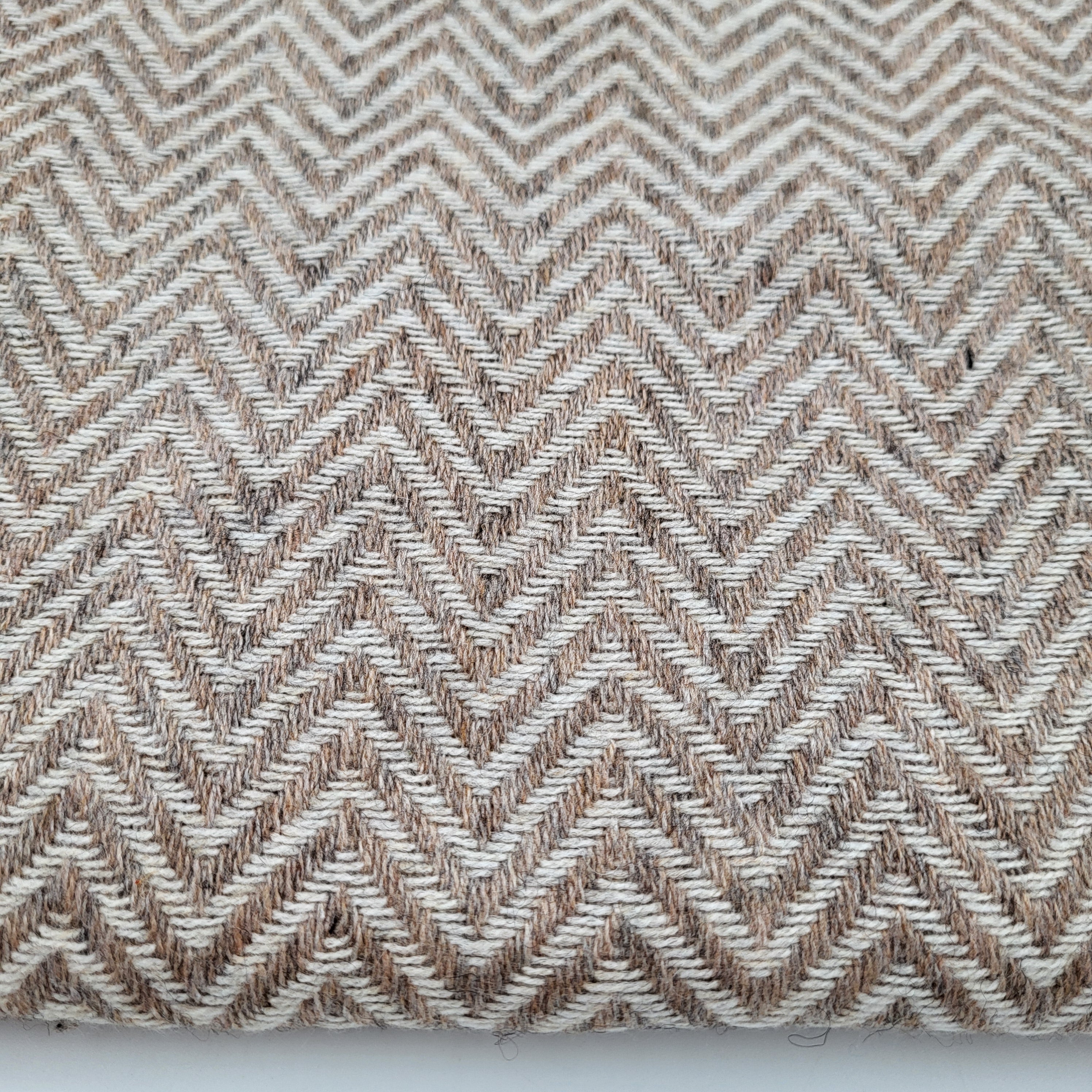 Cashmere herringbone shawl in beige with a natural base