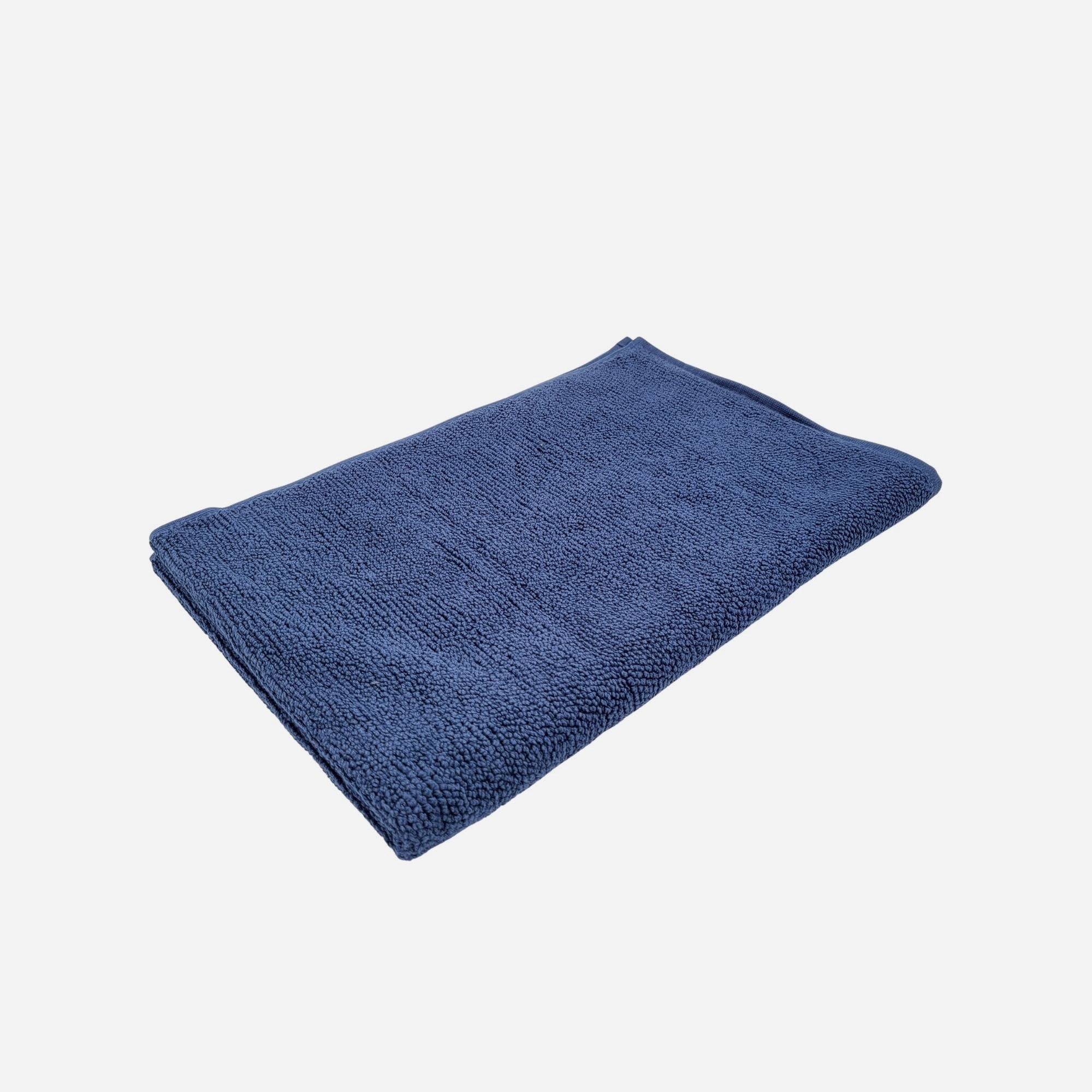 Navy organic cotton bath mat, 55 by 83 cm