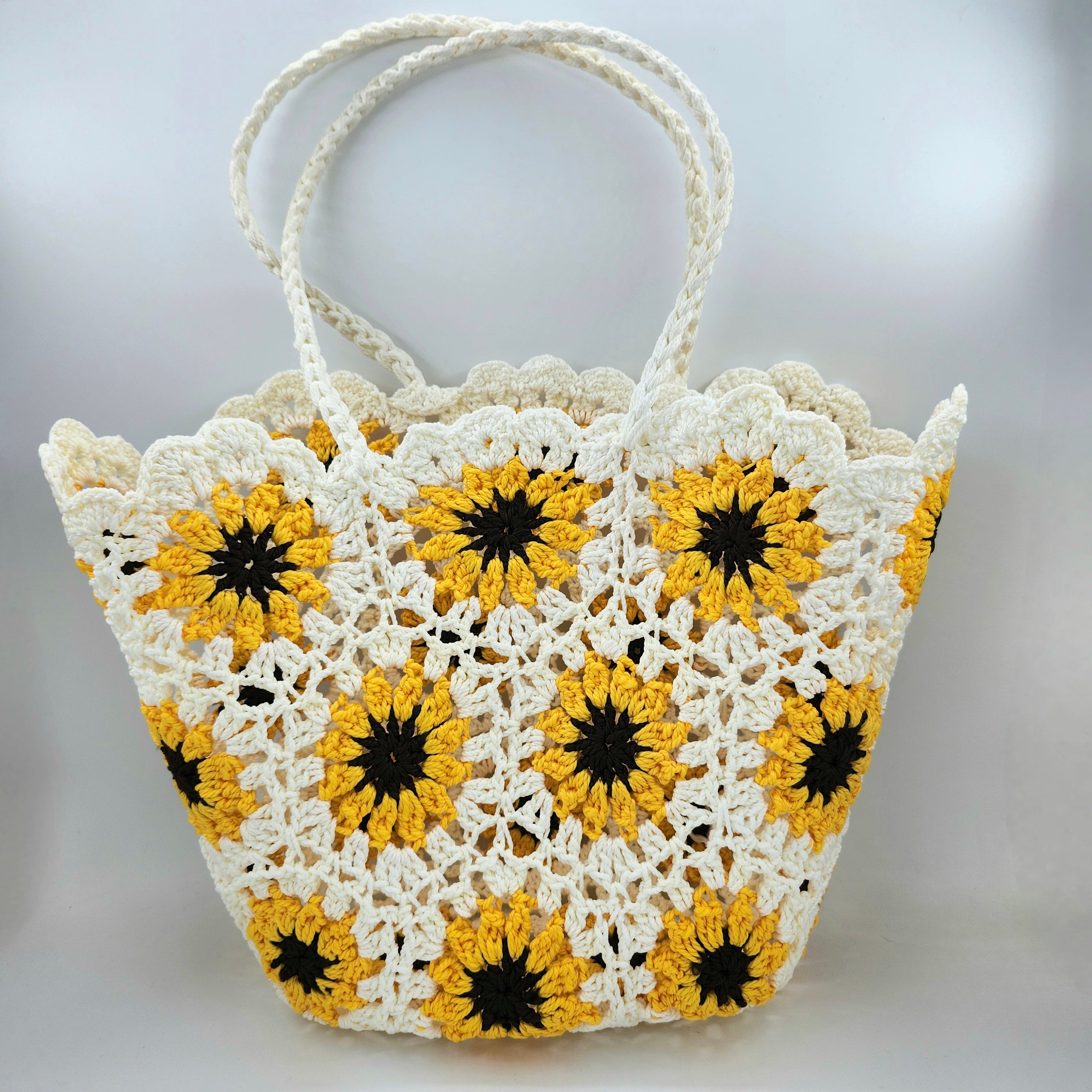 Crochet beach bag with a sunflower design