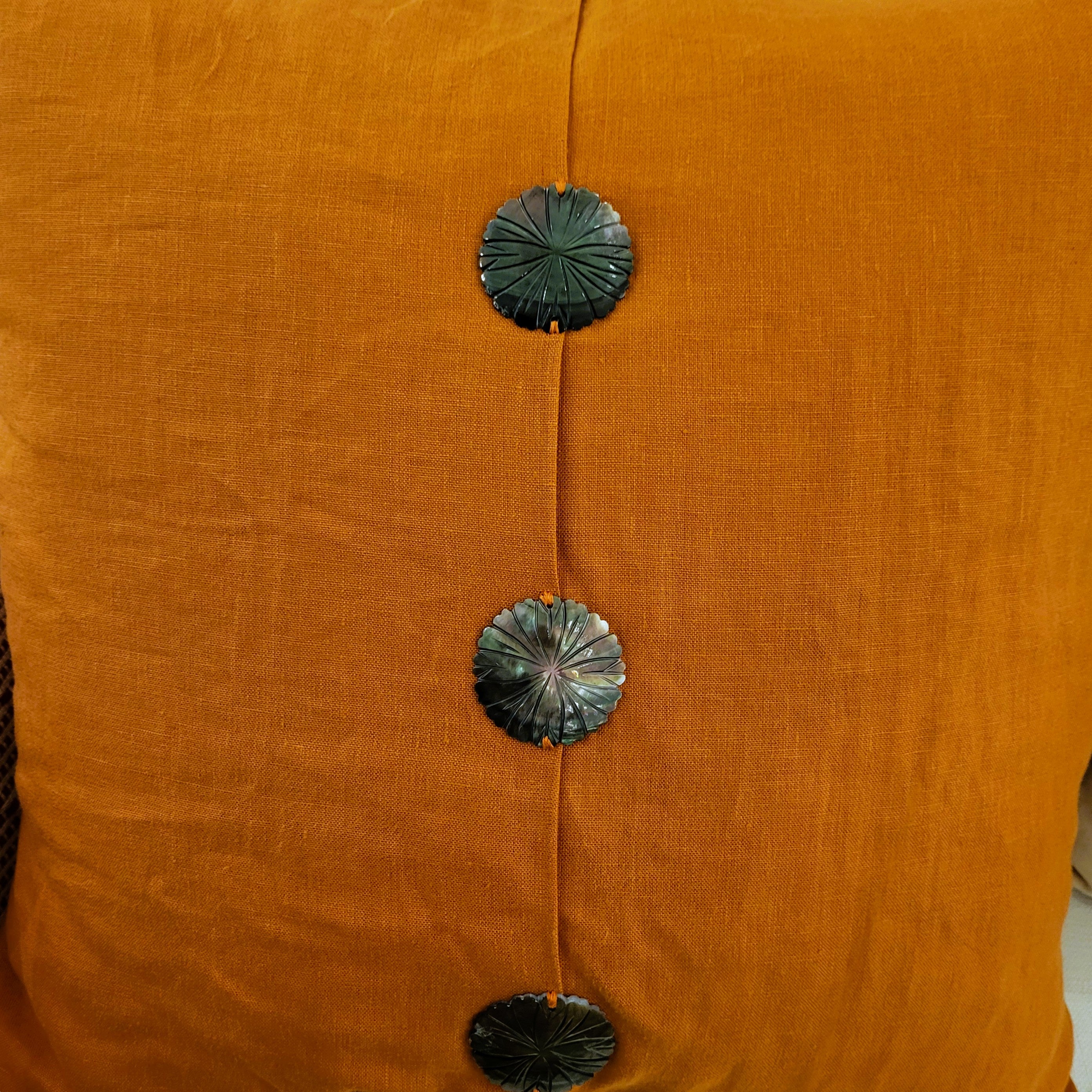 Turmeric linen cushion with three mother of pearl buttons, 60 x 60 cm