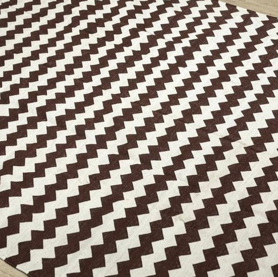 Handwoven cotton dhurry rug in brown and white, 180 x 270 cm