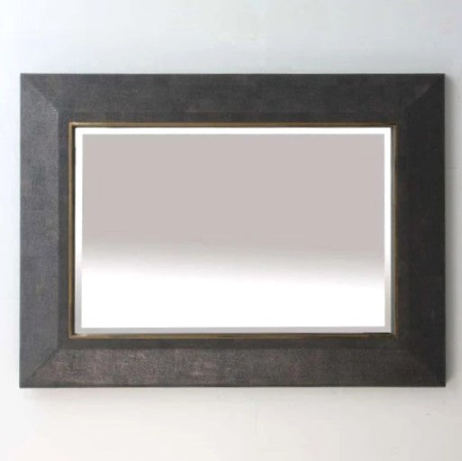 Rectangular mirror with a brown faux shagreen frame with brass trim