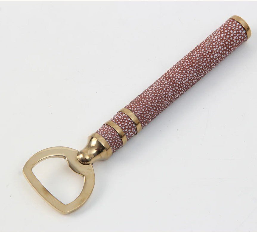 Faux shagreen bottle opener in coral by Forwood Design, brass-plated stainless steel with textured handle