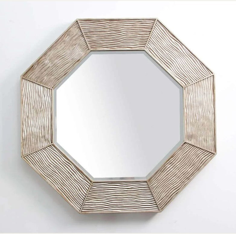 Lennox octagonal wall mirror in antique silver leaf with a carved ripple-effect frame