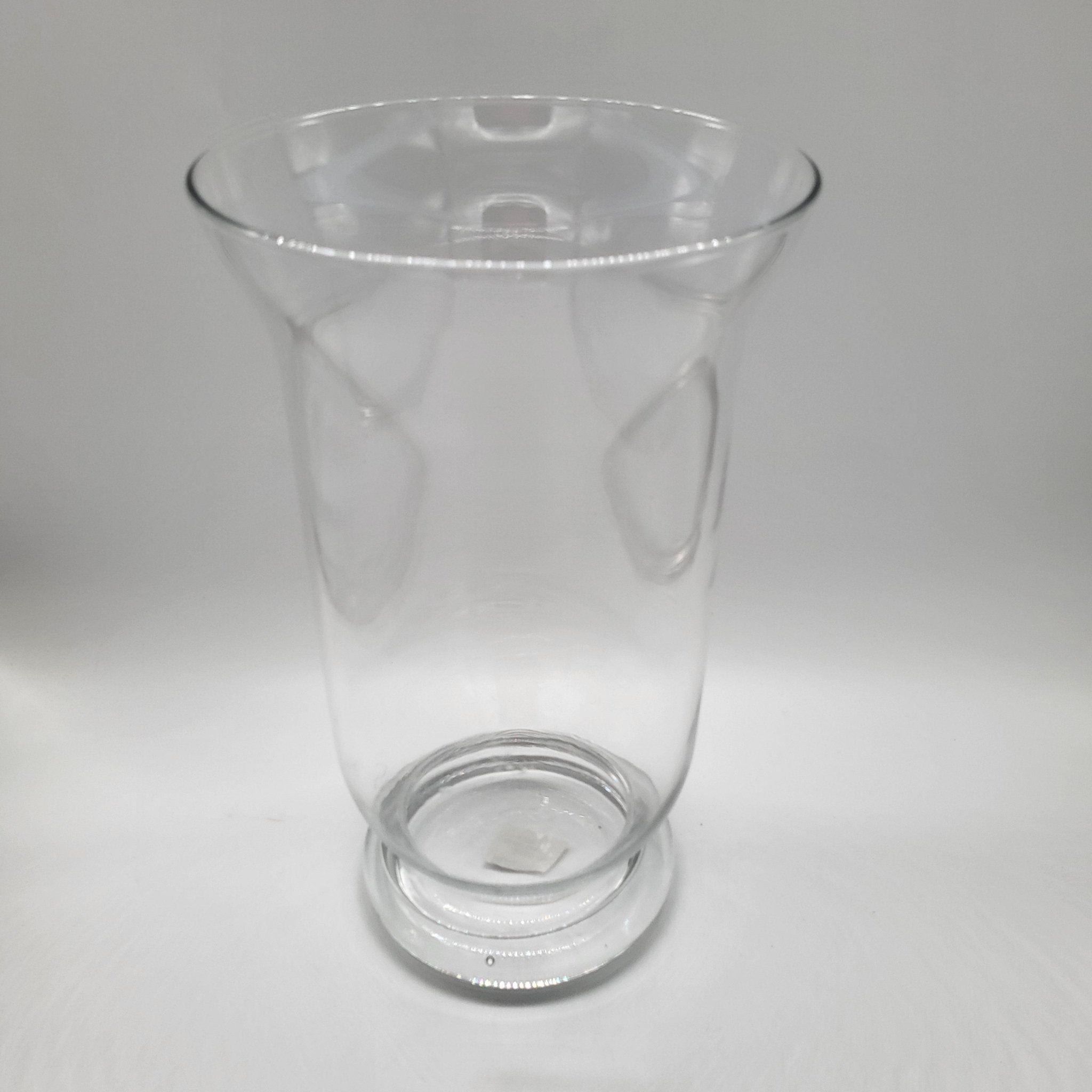 Clear glass vase or hurricane lamp, elegant design for flowers or a pillar candle