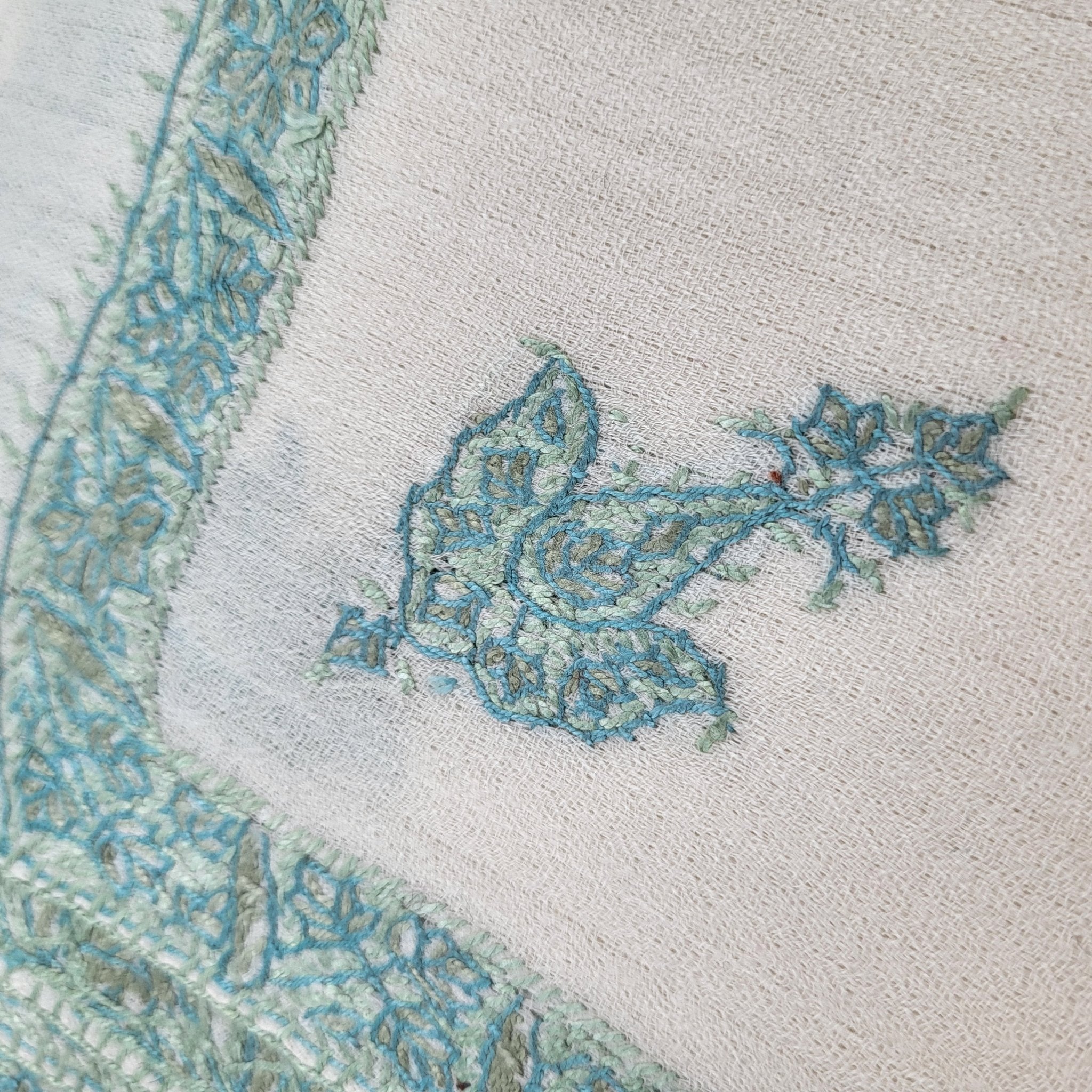 Pashmina shawl with hand-embroidered border and motif in white and aqua, 70 x 200 cm