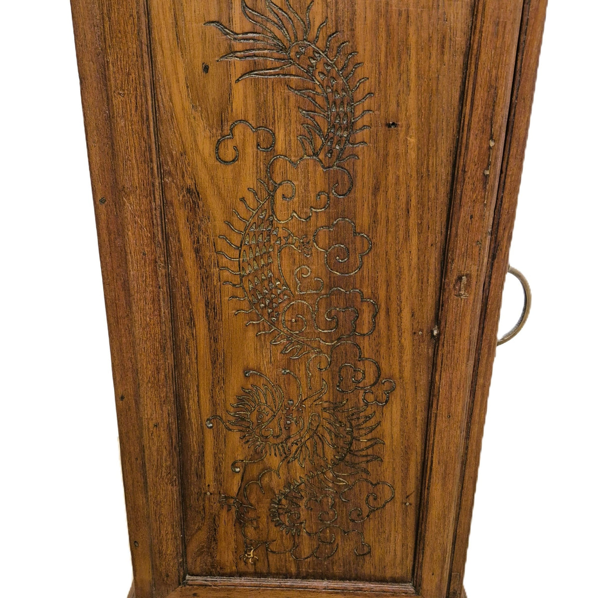 Small teak cabinet with a glass fronted section above a cupboard, carved with a dragon motif, 84 cm high