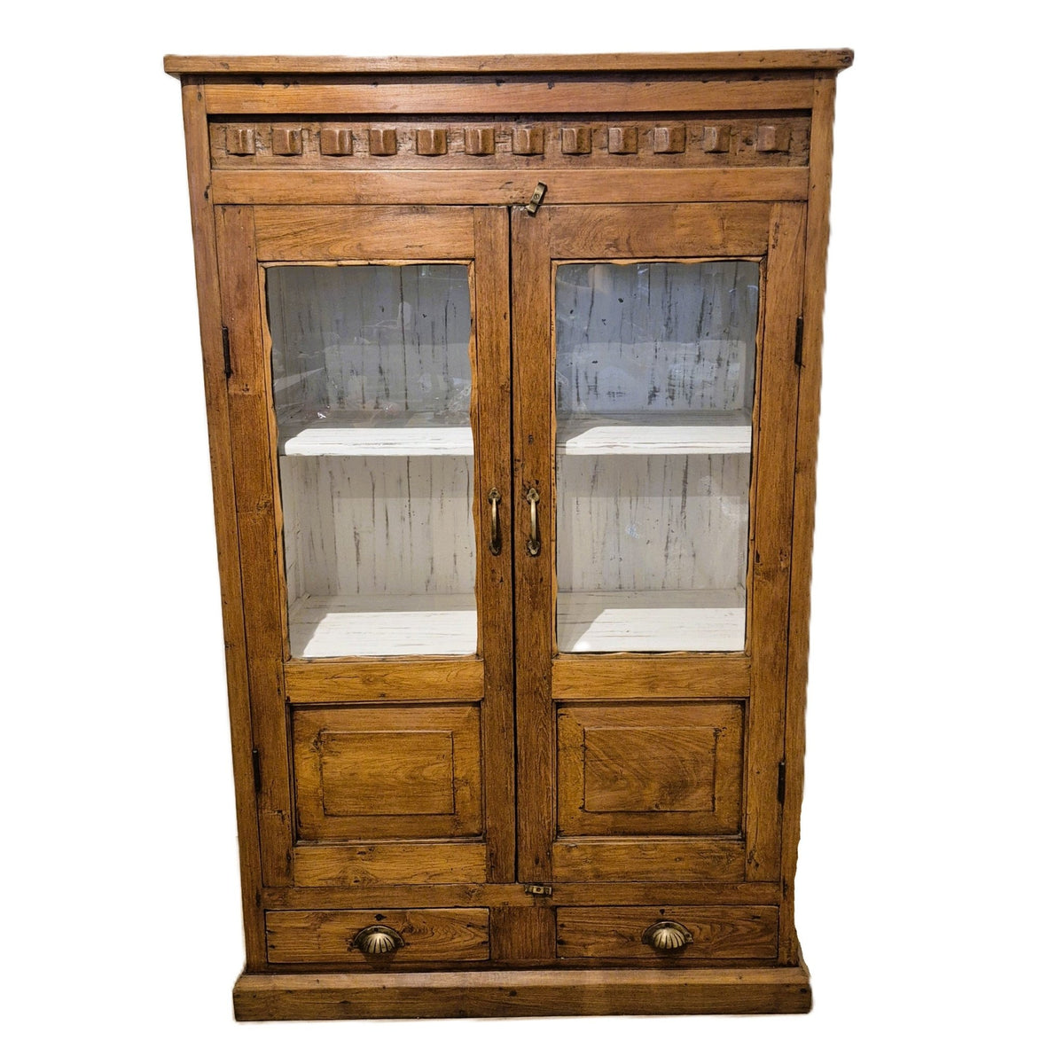 Vintage teak cabinet in a natural finish with two glazed doors, two drawers at the base and brass handles, 150cm high, India