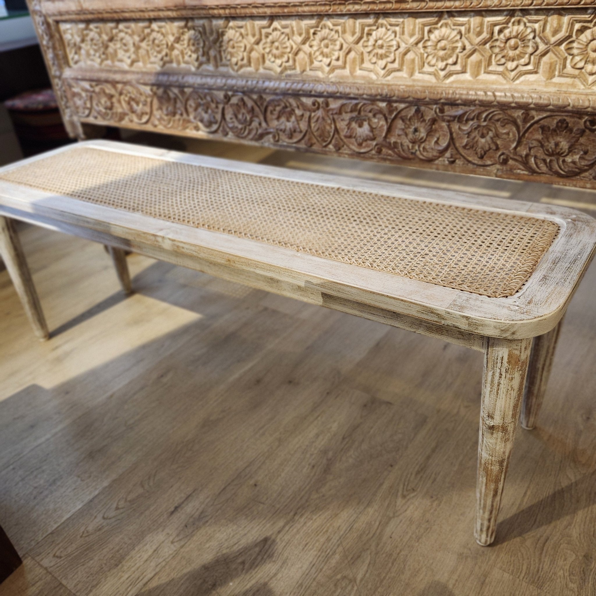 Mango wood bench with a woven cane top