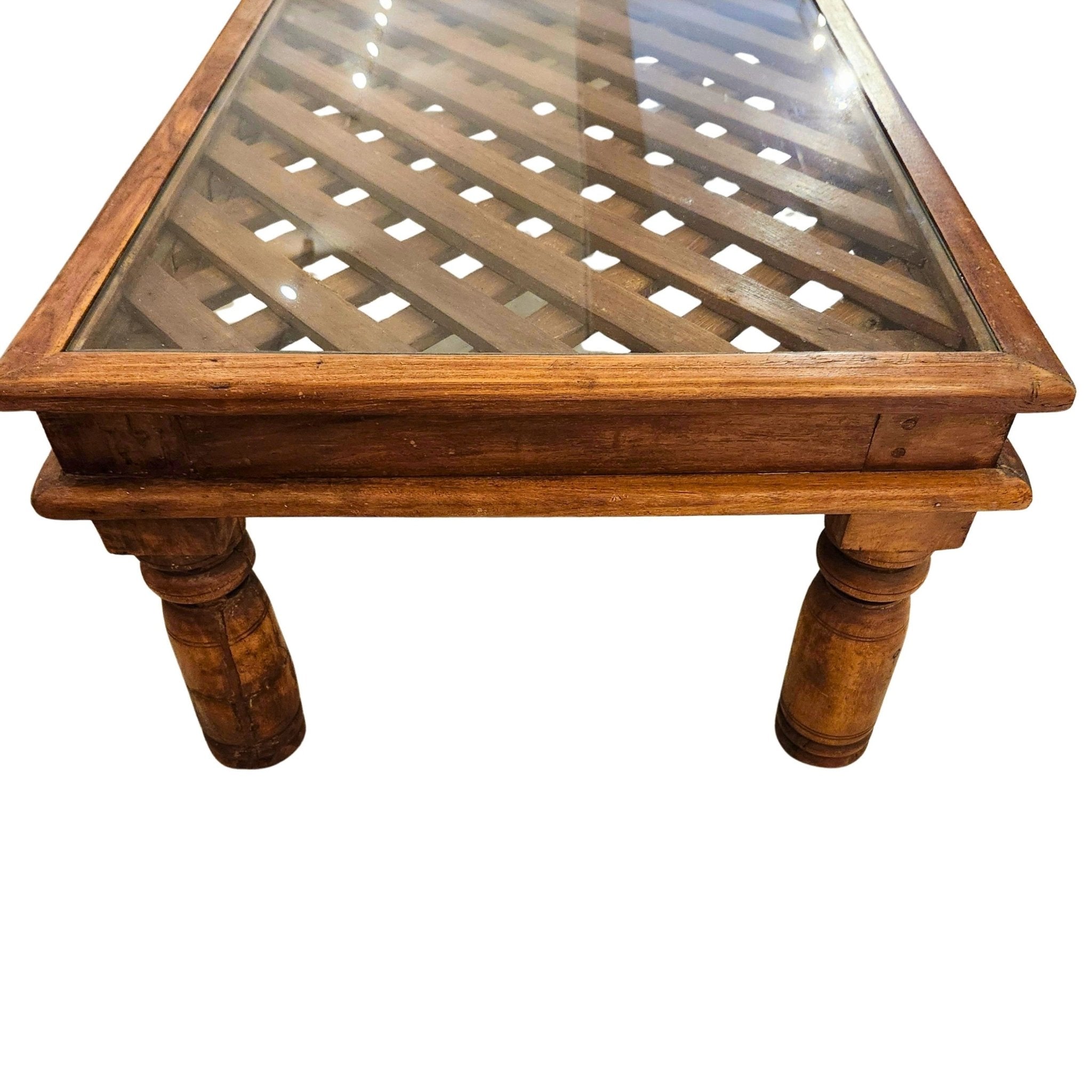 Teak lattice-work coffee table with glass top, detail
