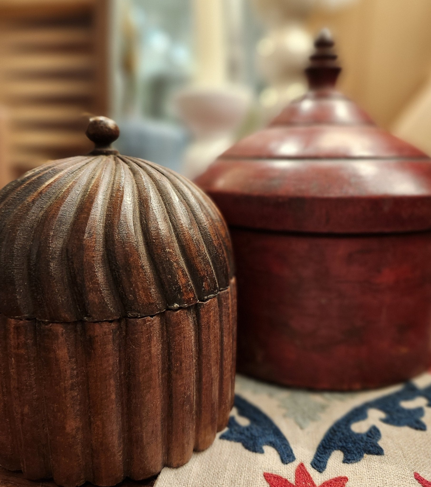 Vintage red lacquer boxes with stupa lids, grouped