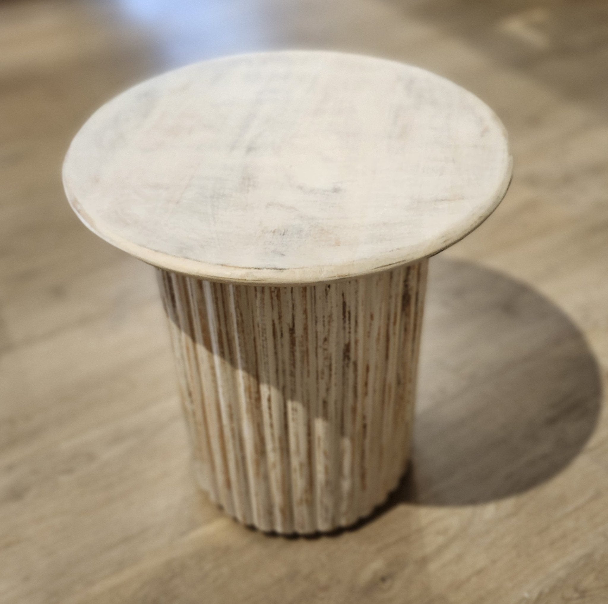 Round limed wood side table, fluted pedestal base, detail