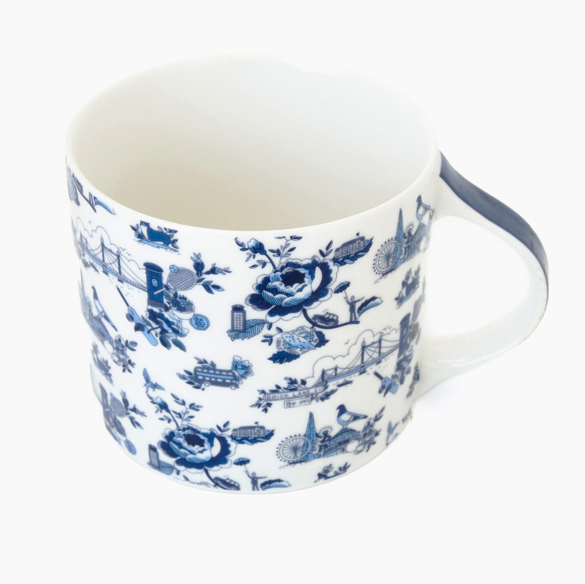 London Toile mug in white and blue on a white background