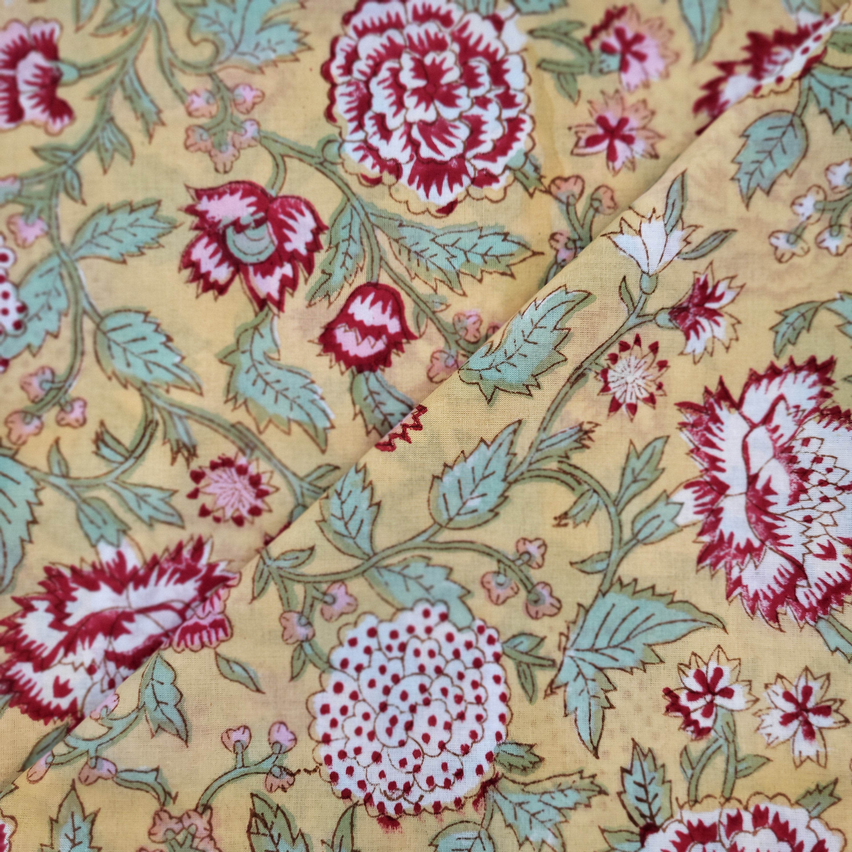 Block-print cotton napkins in a yellow summertime print, 50 cm