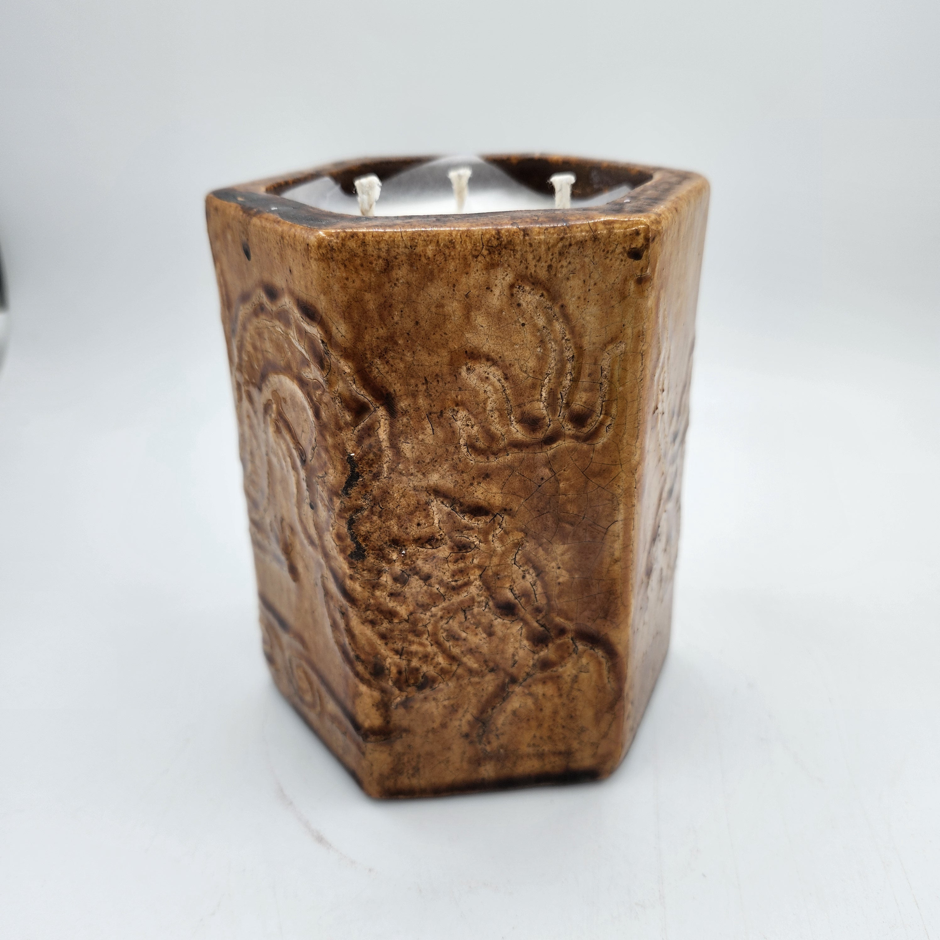 Amber Dragon scented candle, hexagonal amber-glazed pot with a dragon, Tiger's Head scent