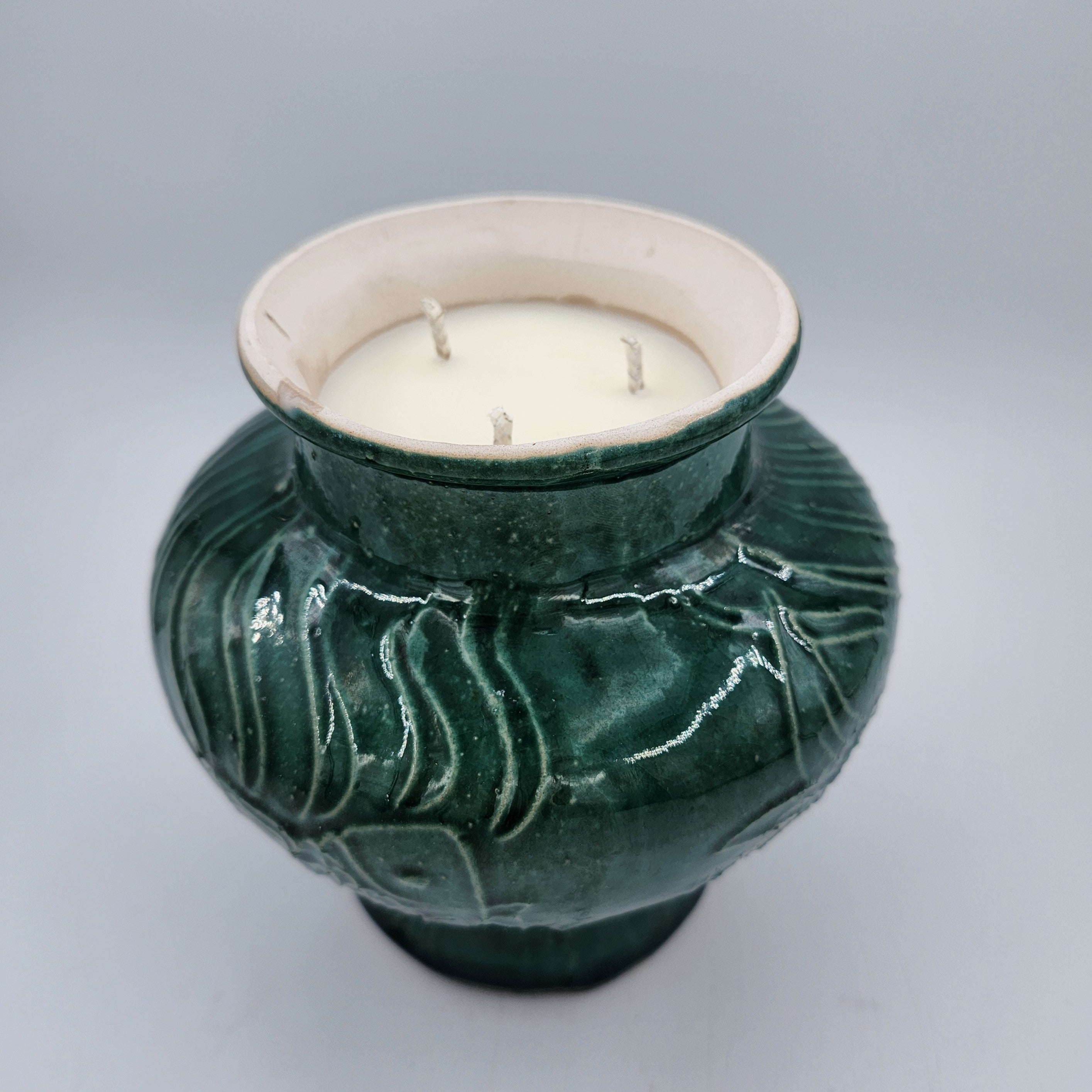Jade Fish candle, deep green fish-motif vase, detail