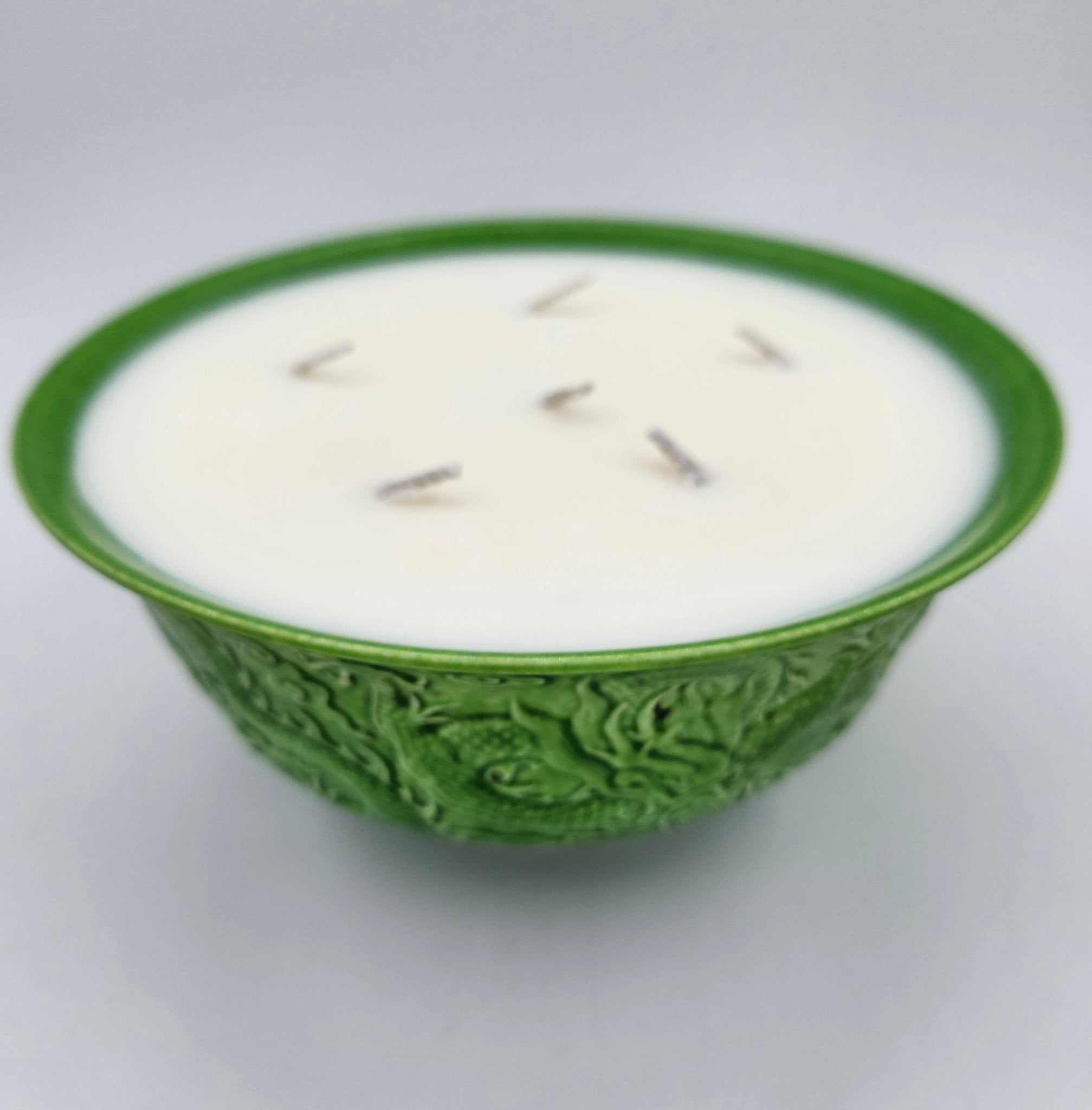 Grass Green Dragon candle, green dragon bowl, styled view