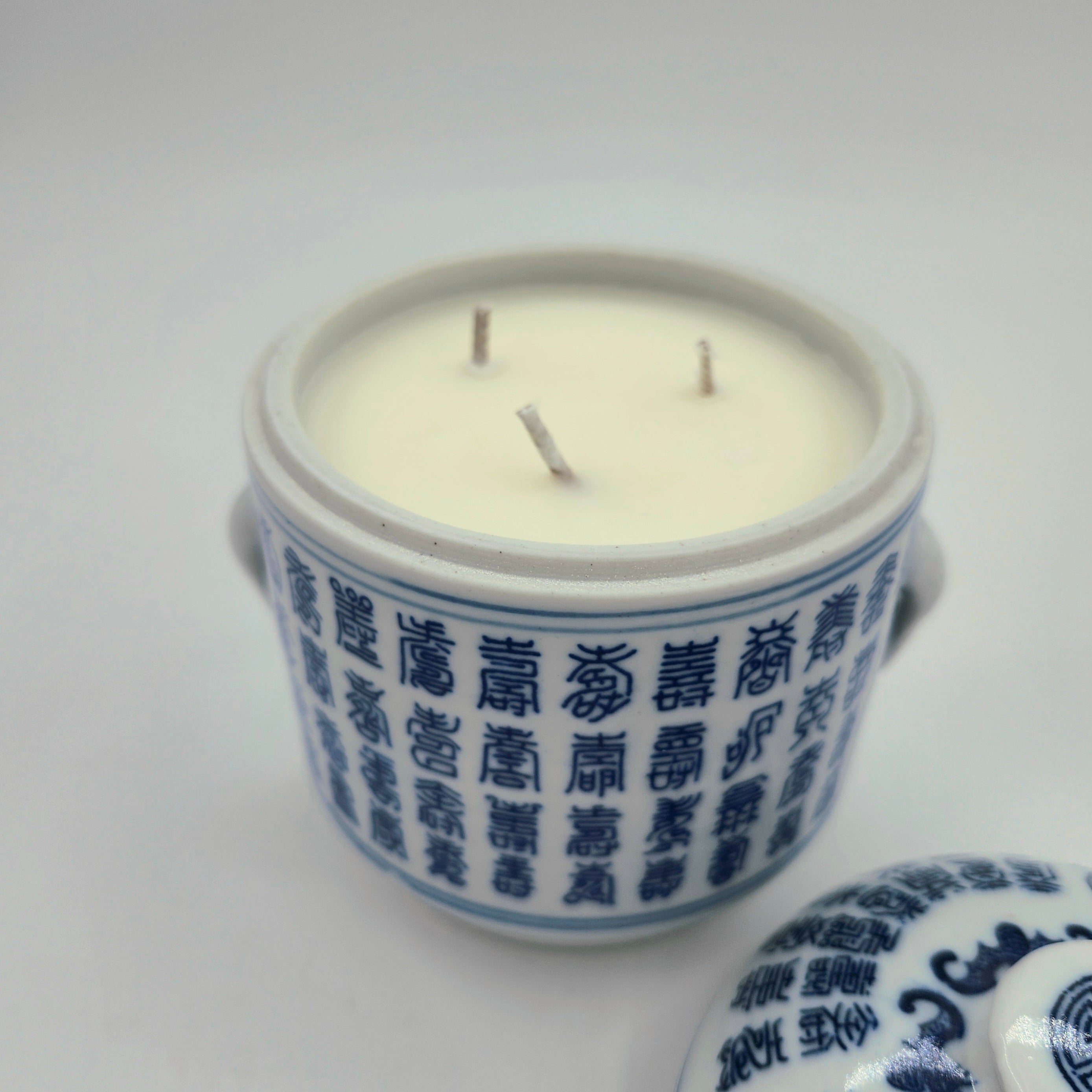 Tradition candle, Chinese-character ceramic pot, styled view