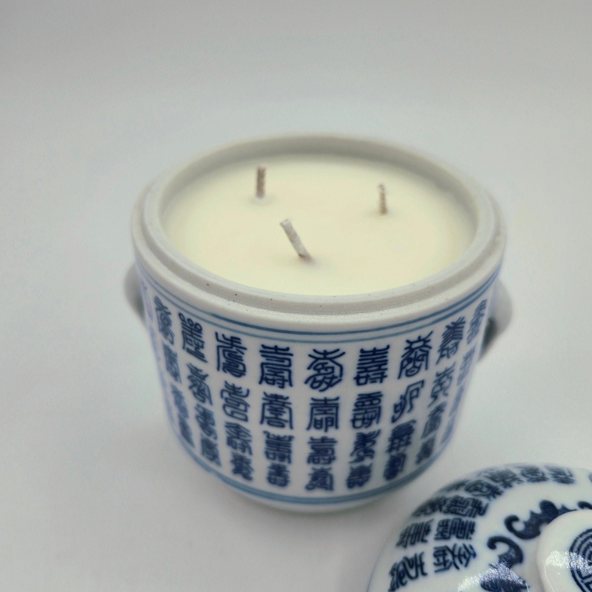 Tradition candle, Chinese-character ceramic pot, styled view
