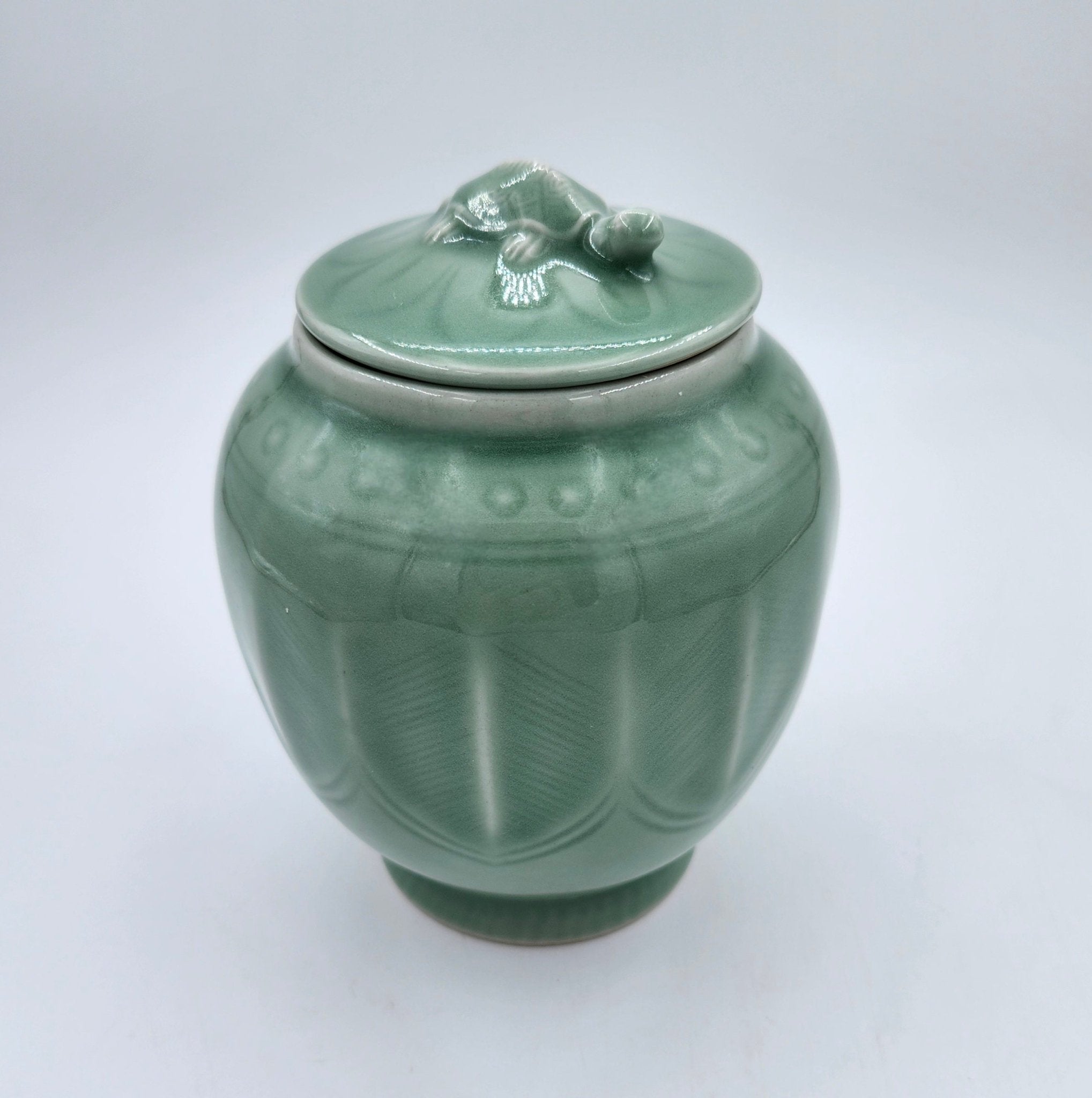 Wisdom scented candle, vintage celadon ceramic pot with tortoise lid handle, Lobster Bay scent