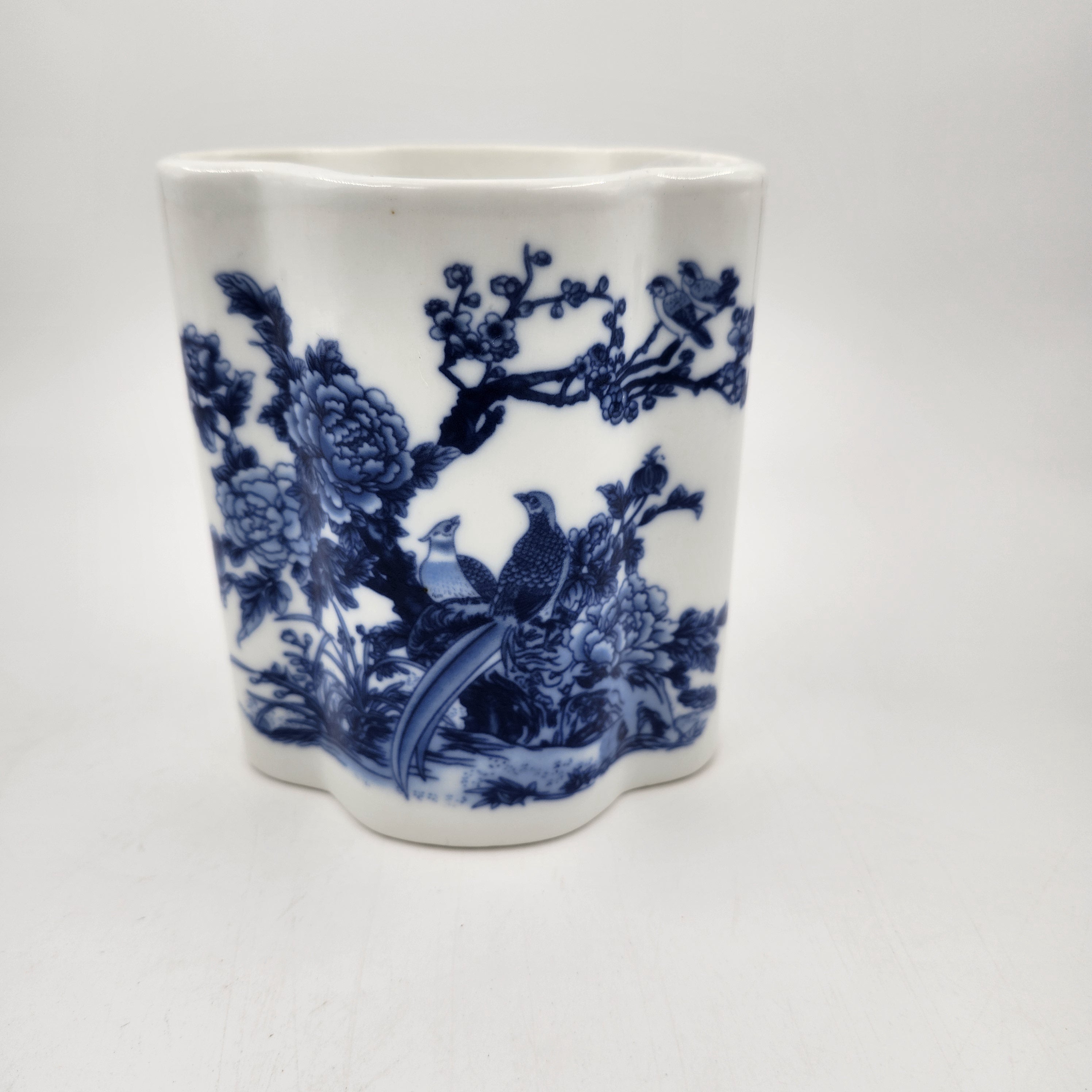 White ceramic scented candle with blue floral and pheasant design