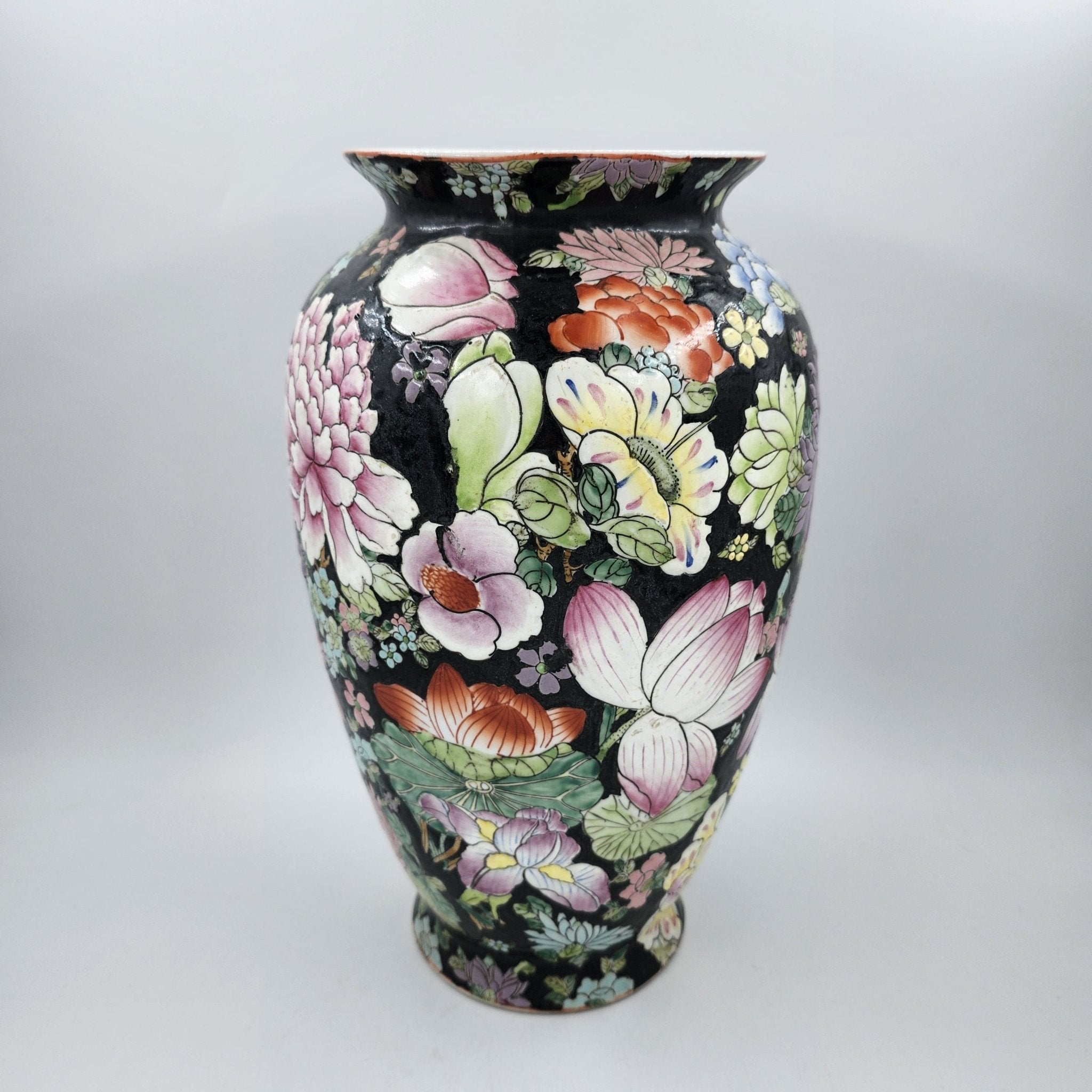 Vintage Famille Rose floral vase on black ground, styled