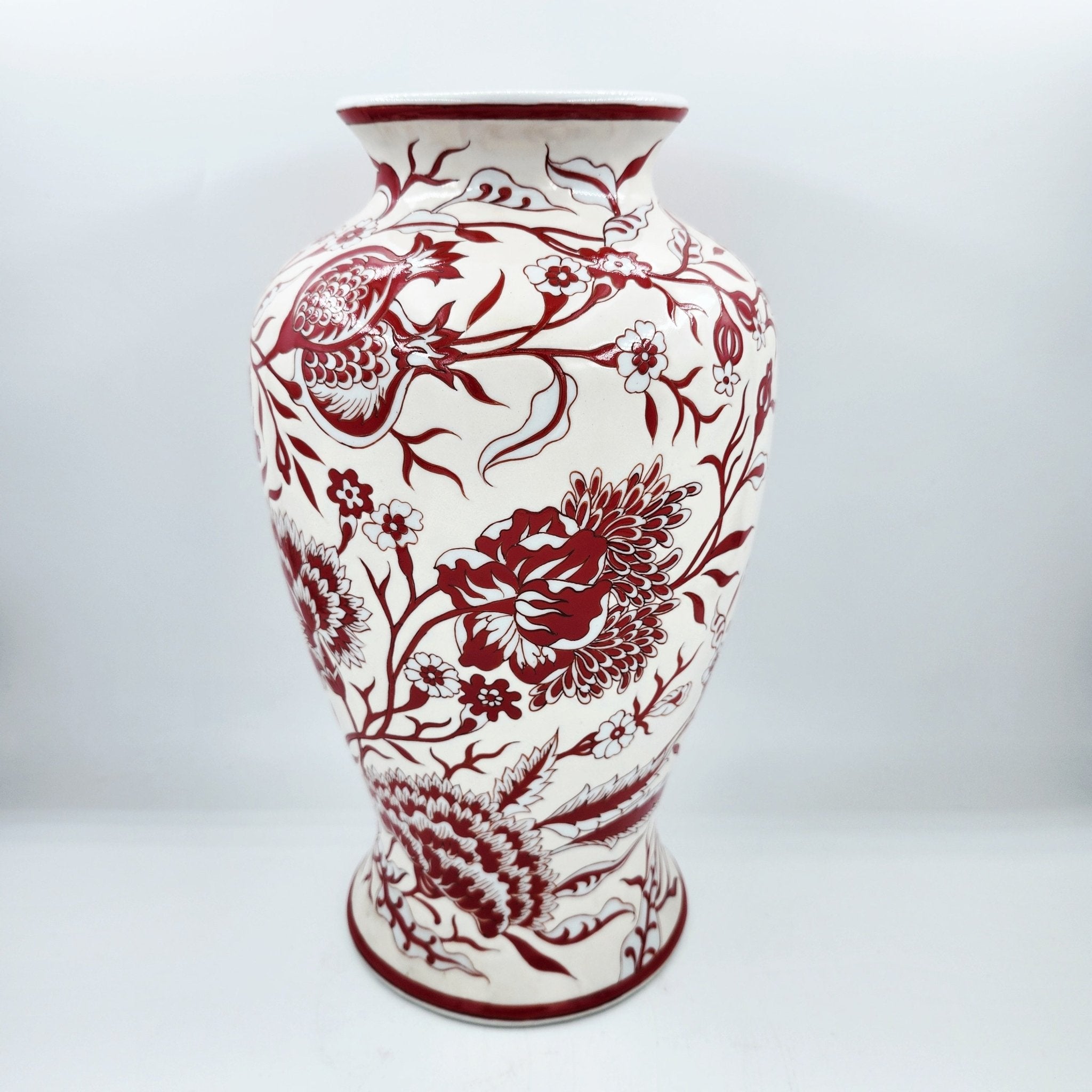 Porcelain vase with red and white flowers and pomegranates on cream, 32cm high
