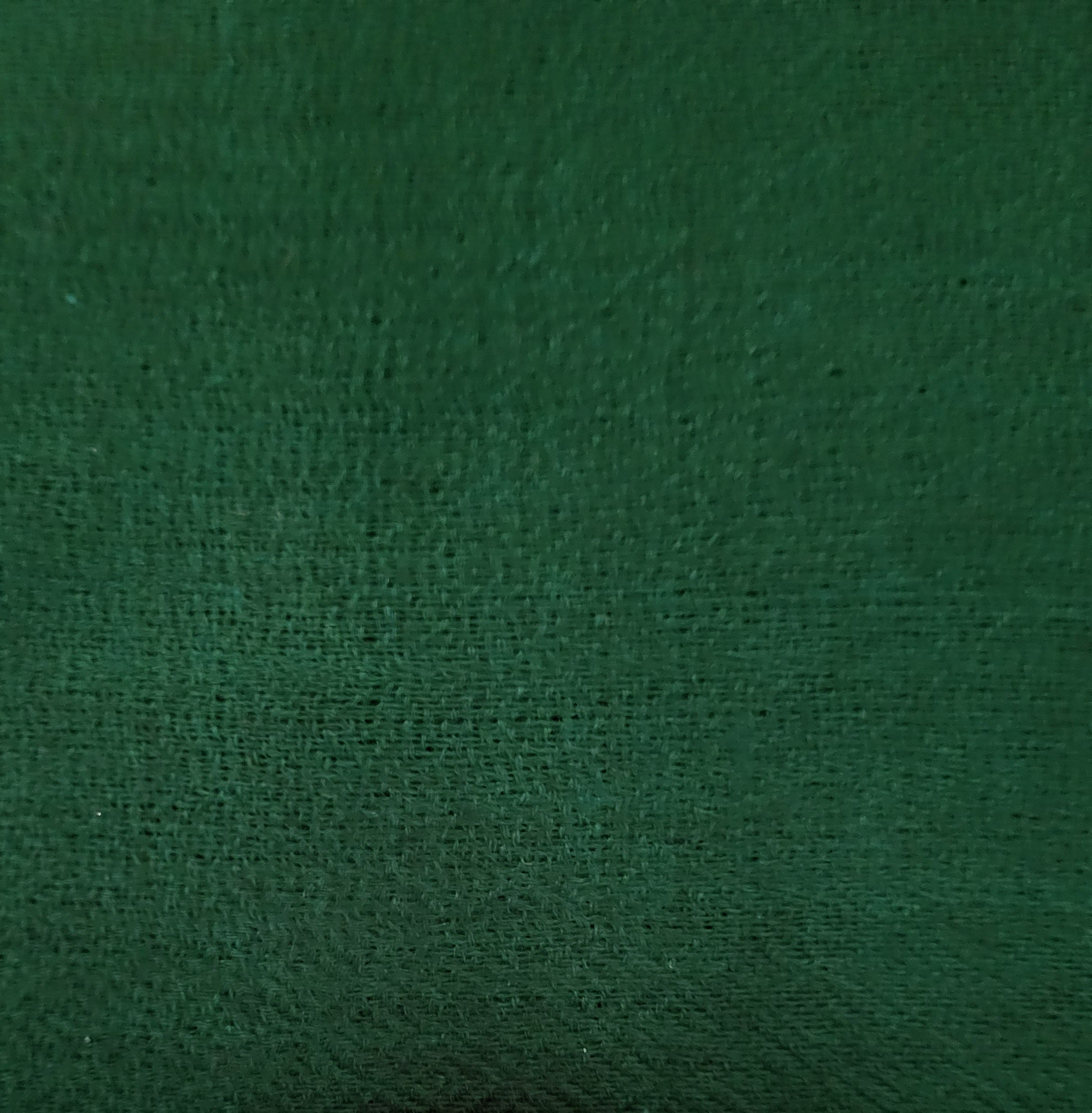Forest green plain 100% pashmina shawl, a timeless, soft and lightweight wrap draped over the shoulders