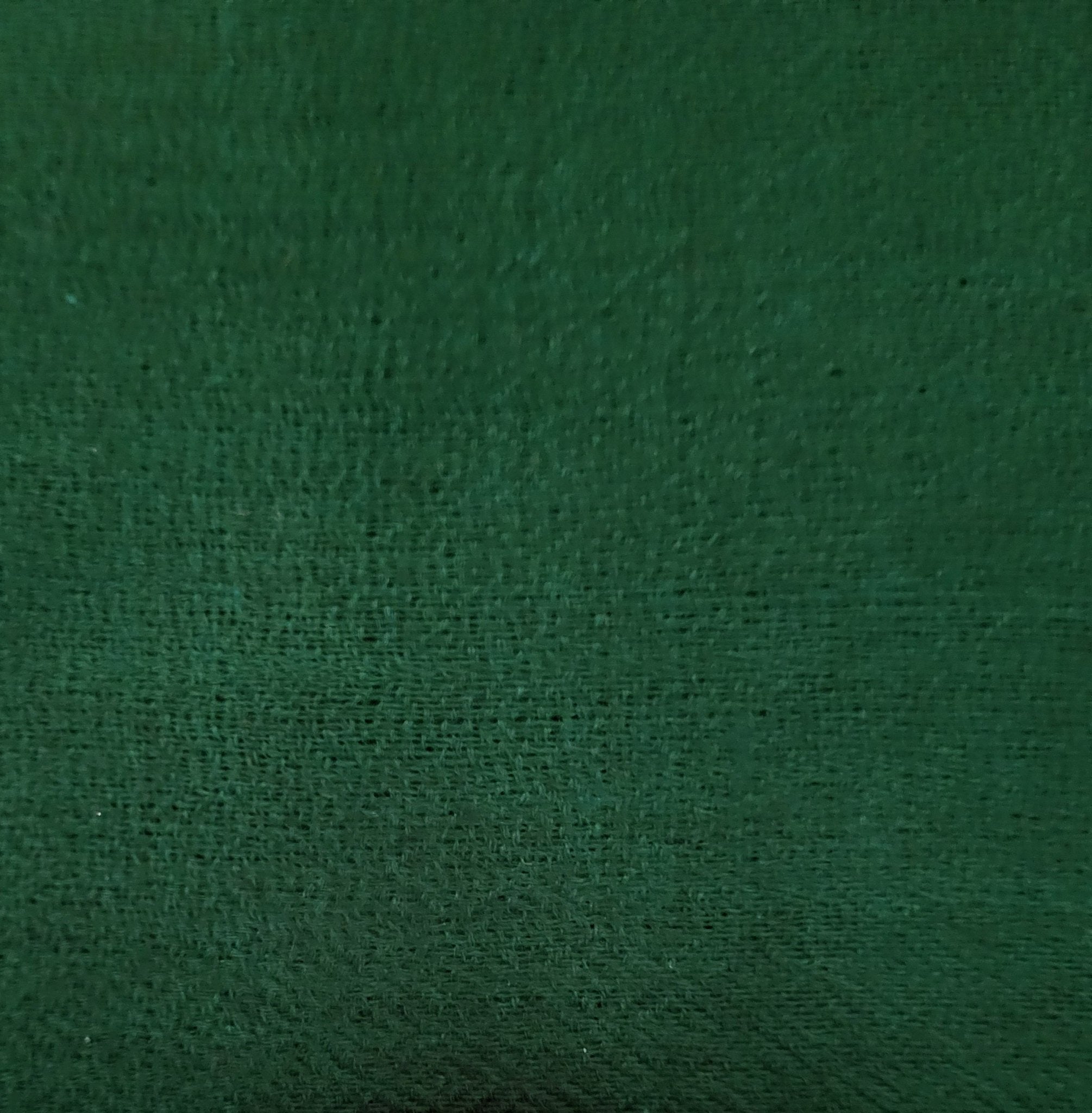 Forest green plain 100% pashmina shawl, a timeless, soft and lightweight wrap draped over the shoulders