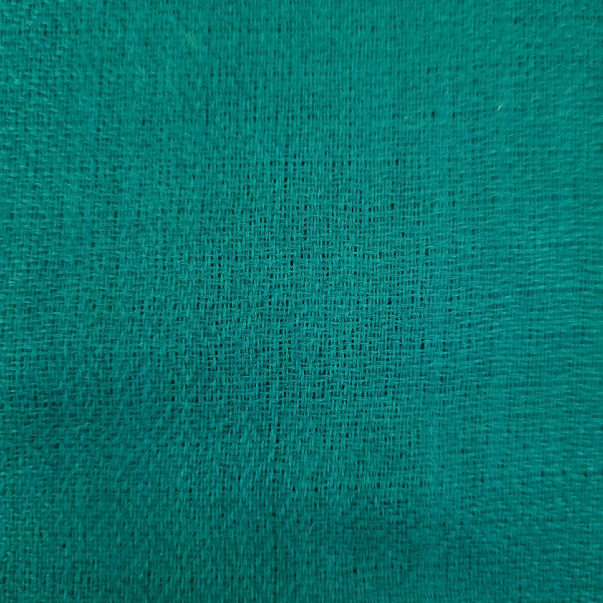 Emerald green plain pashmina shawl, finely woven, soft and lightweight, worn draped or around the neck