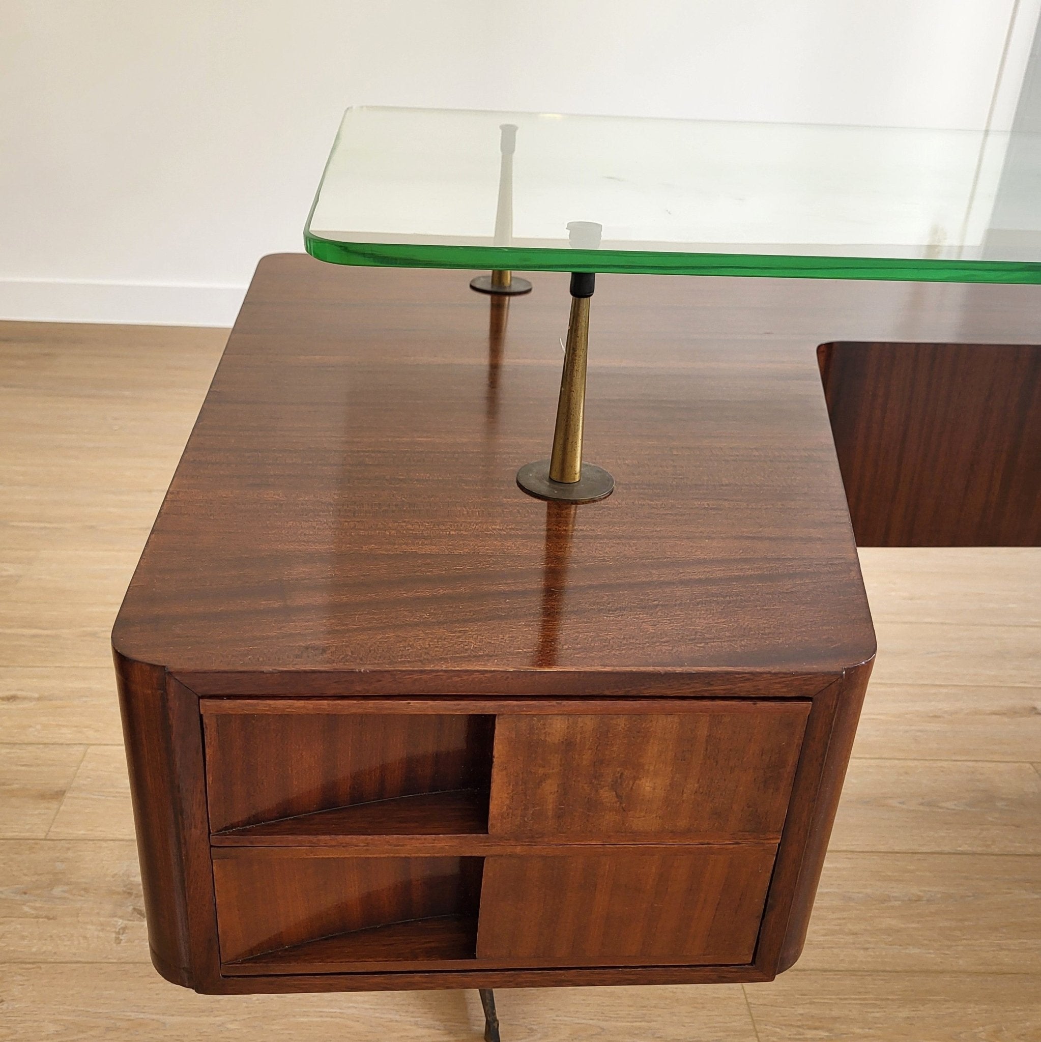 Mid-century executive desk, glass top and brass frame, detail view
