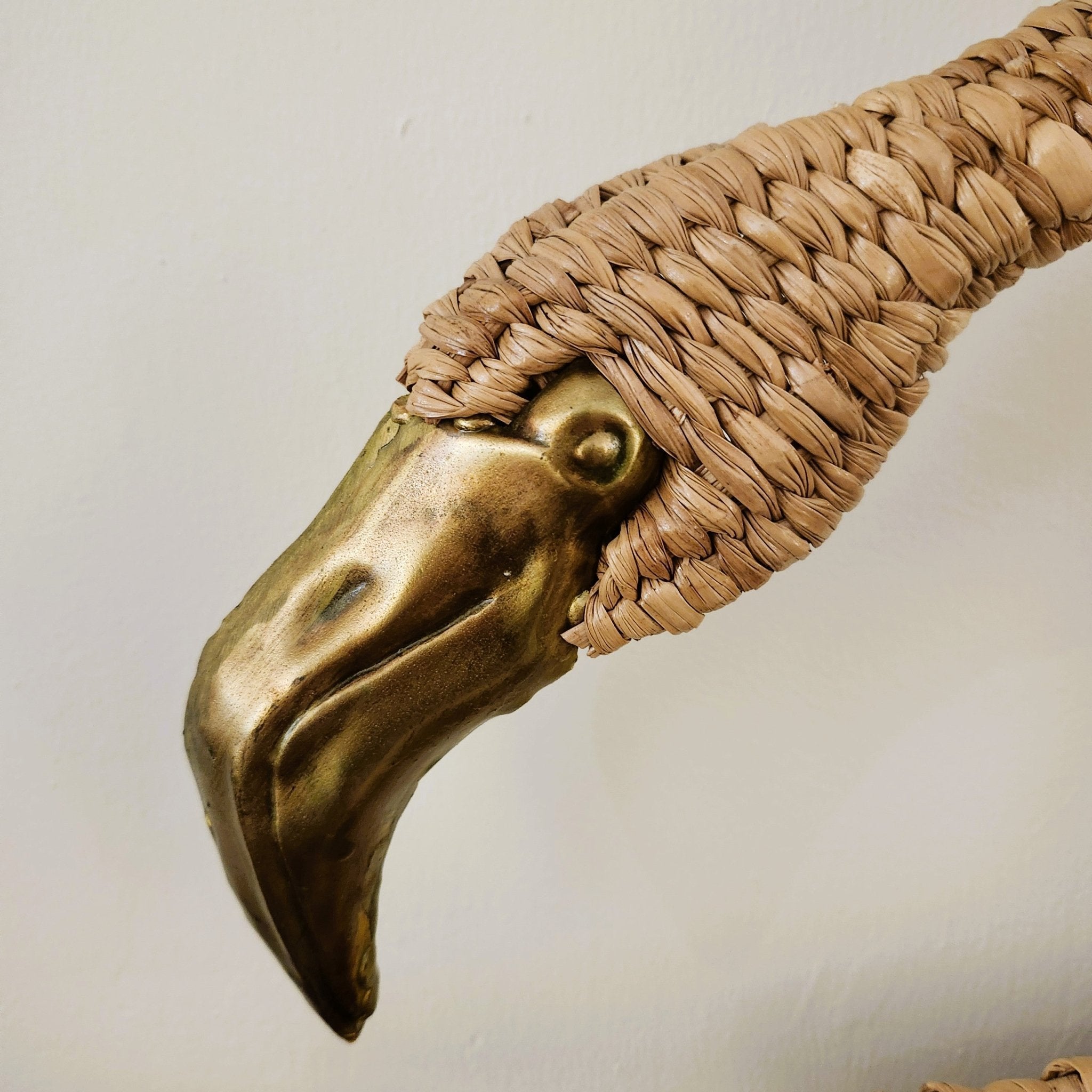 Flamingo screen detail, rattan texture with brass accents, Maria Lopez Torres