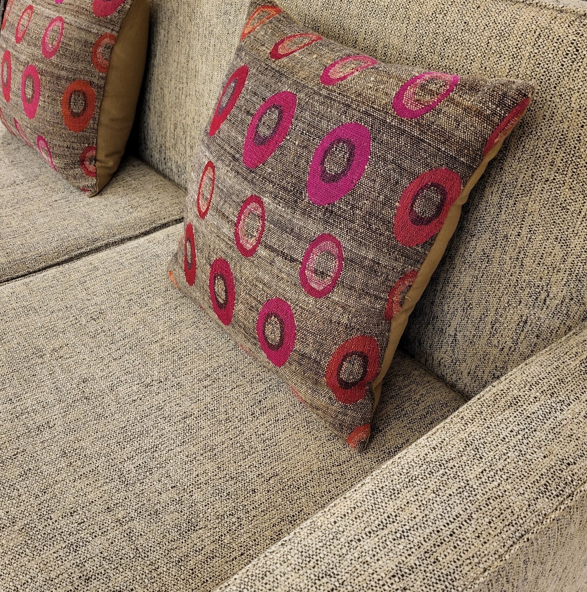 Robsjohn-Gibbings sofa styled with cushions